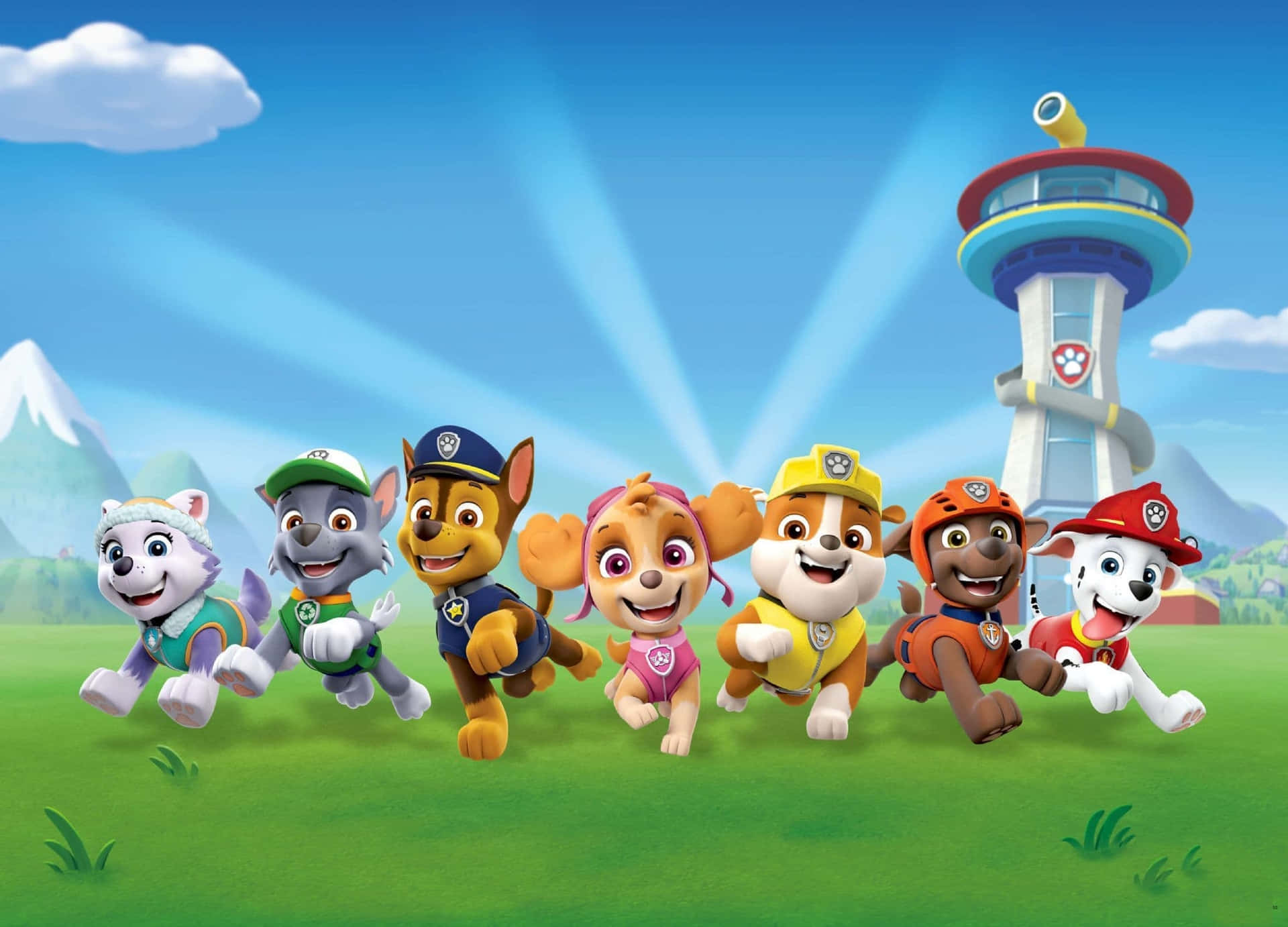 Paw Patrol 小狗在草地上奔跑，朝向背景有山脈的塔樓。 — 汪汪隊立大功 GIF 壁紙