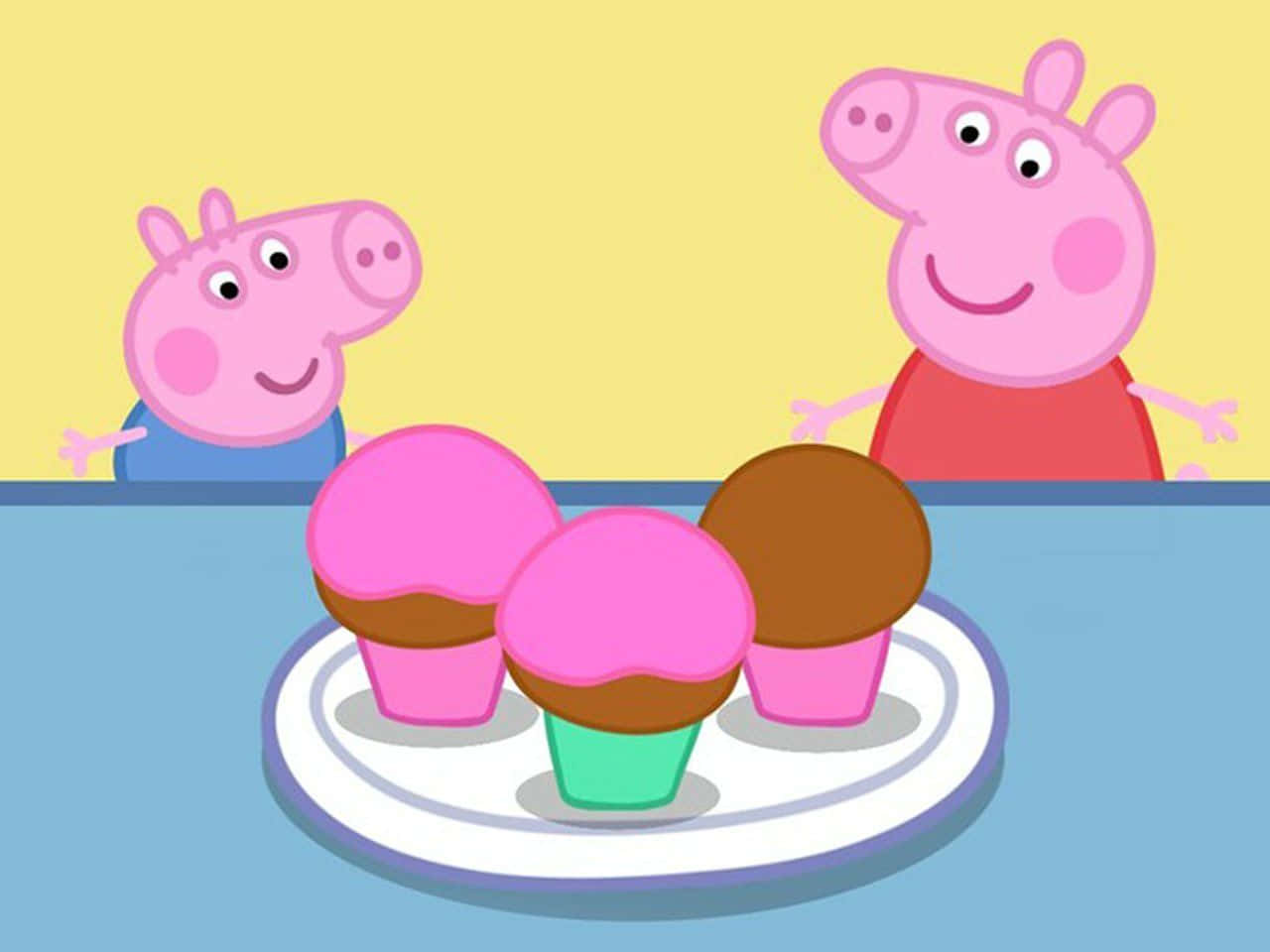 Peppa Pig 和 George 看著盤子上的杯子蛋糕。 — 佩佩豬 GIF 壁紙