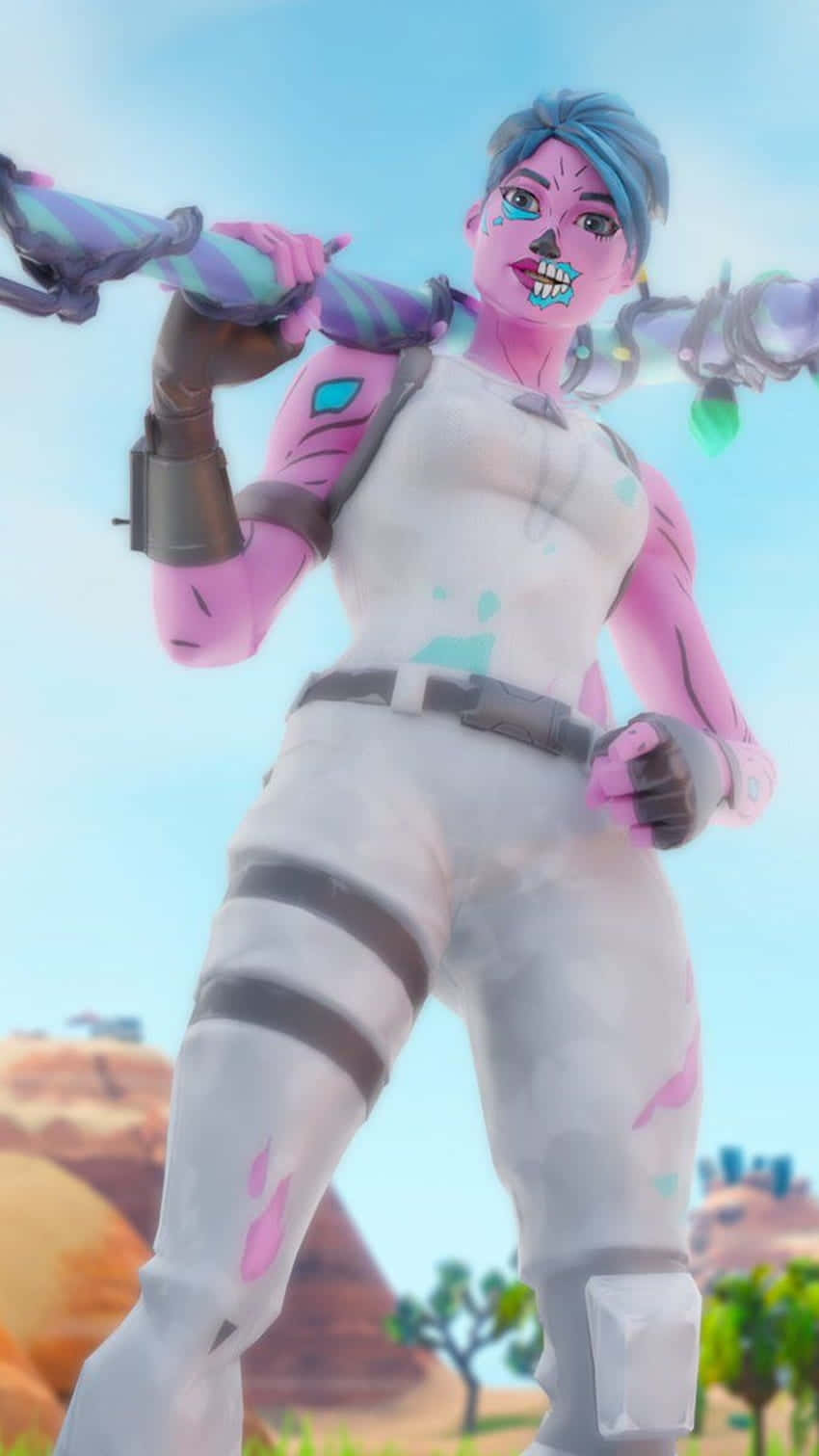  壁紙 — 一個粉紅色皮膚的Fortnite角色，藍色頭髮和機械手臂，在明亮的天空下自信地站在沙漠景觀中。