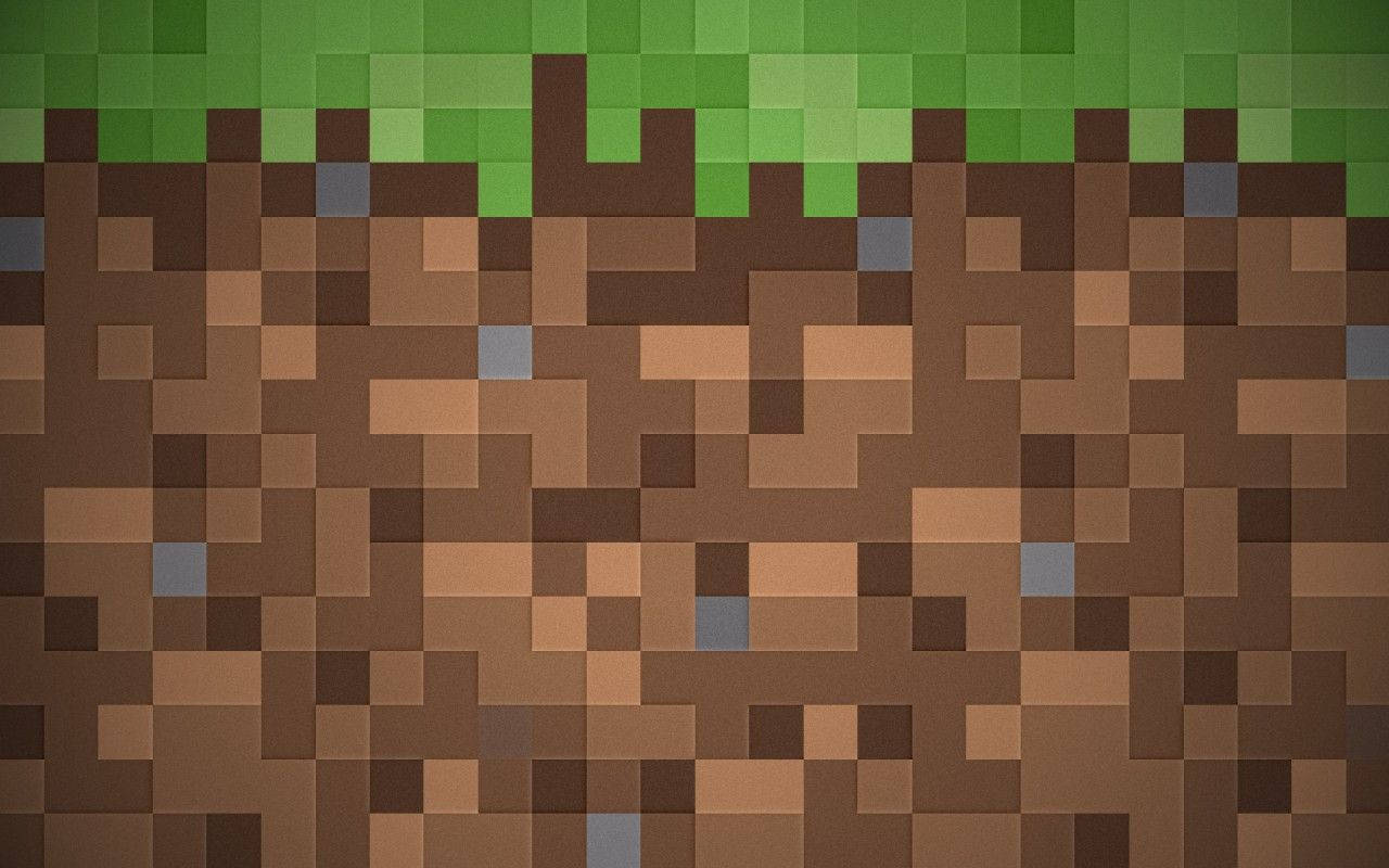 Minecraft泥土方塊，頂部有草皮，像素化風格 — 我的世界 壁紙