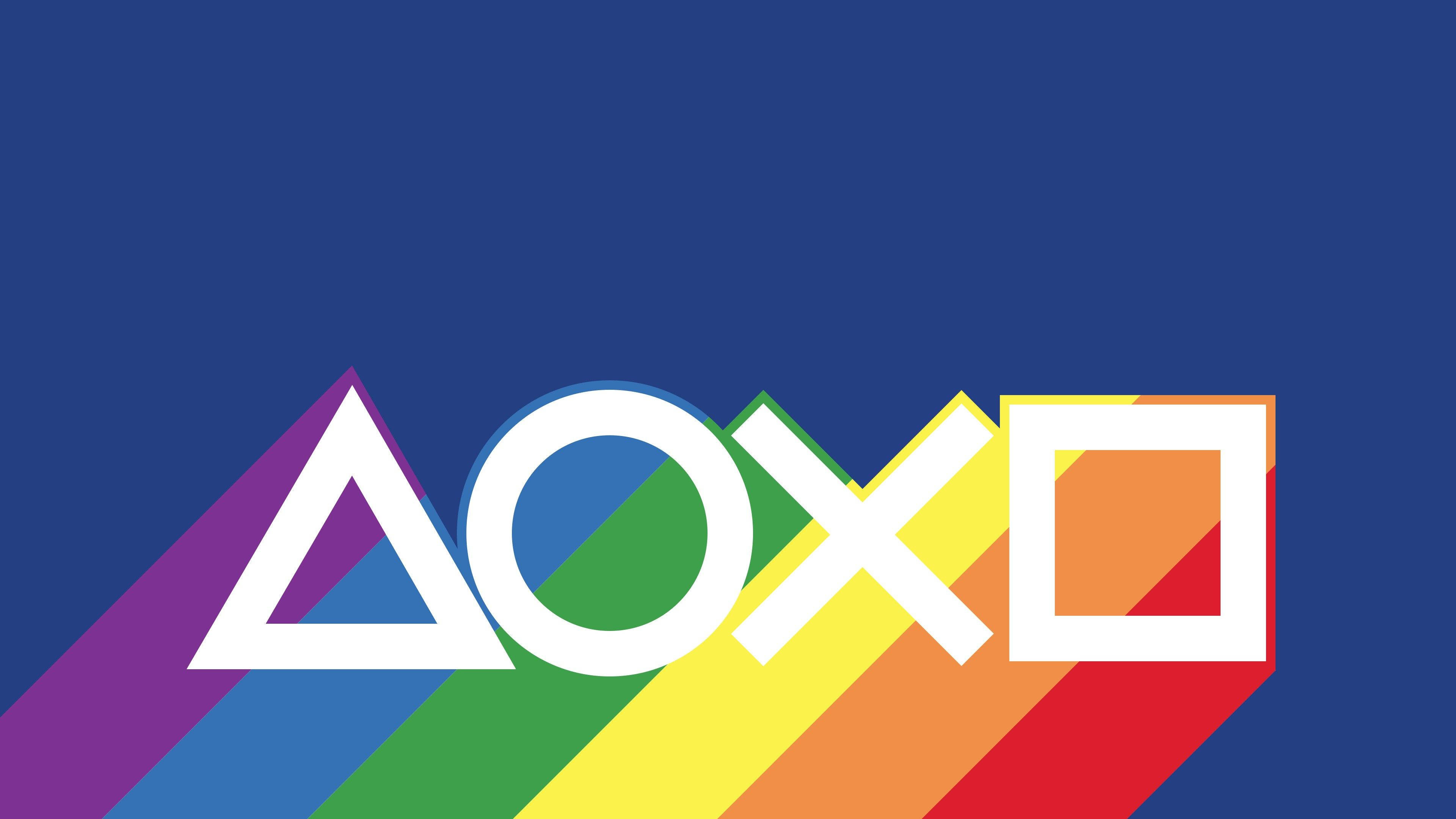 驕傲 桌布 壁紙 — PlayStation 標誌以粗體白色形狀呈現，帶有彩虹色對角條紋，背景為深藍色。
