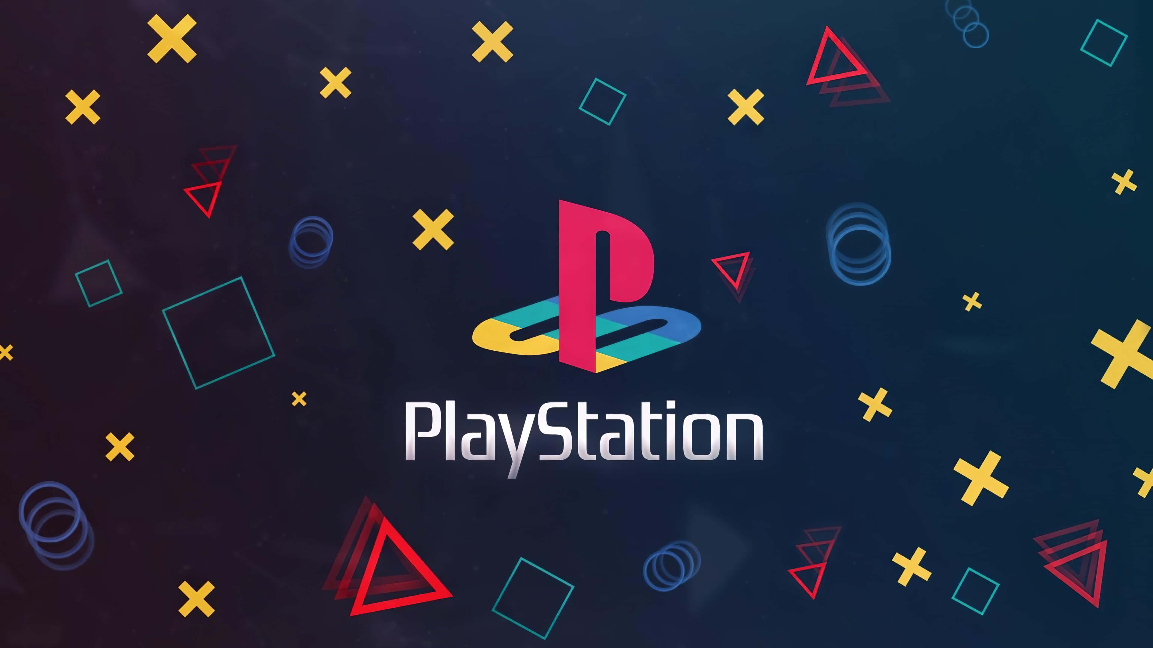 PlayStation 桌布 壁紙 — PlayStation 標誌居中，周圍漂浮著色彩繽紛的幾何形狀，背景為深色漸變。