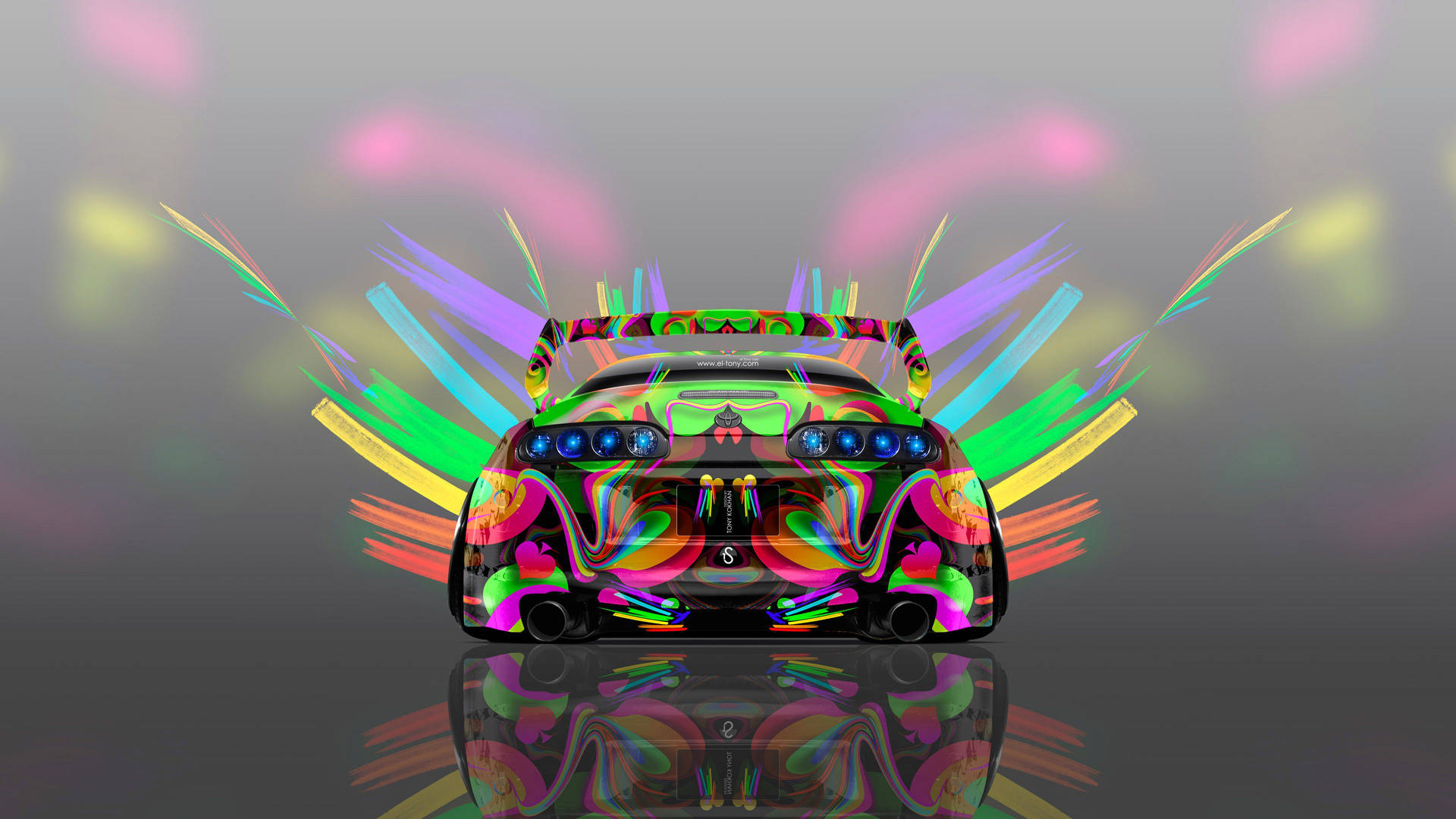 一輛色彩繽紛的未來主義汽車，帶有發光燈光和抽象條紋。 — Toyota Supra 壁紙