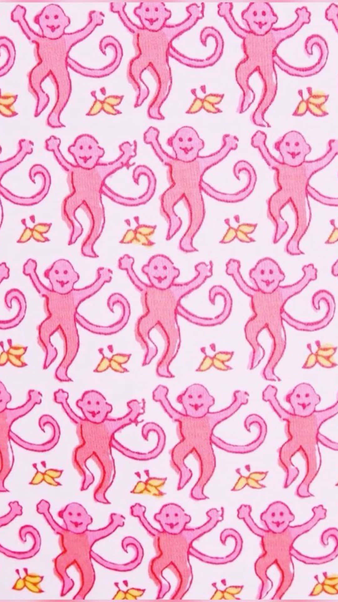  壁紙 — 淺色背景上重複的快樂粉紅色卡通猴子圖案，猴子手持黃色香蕉。