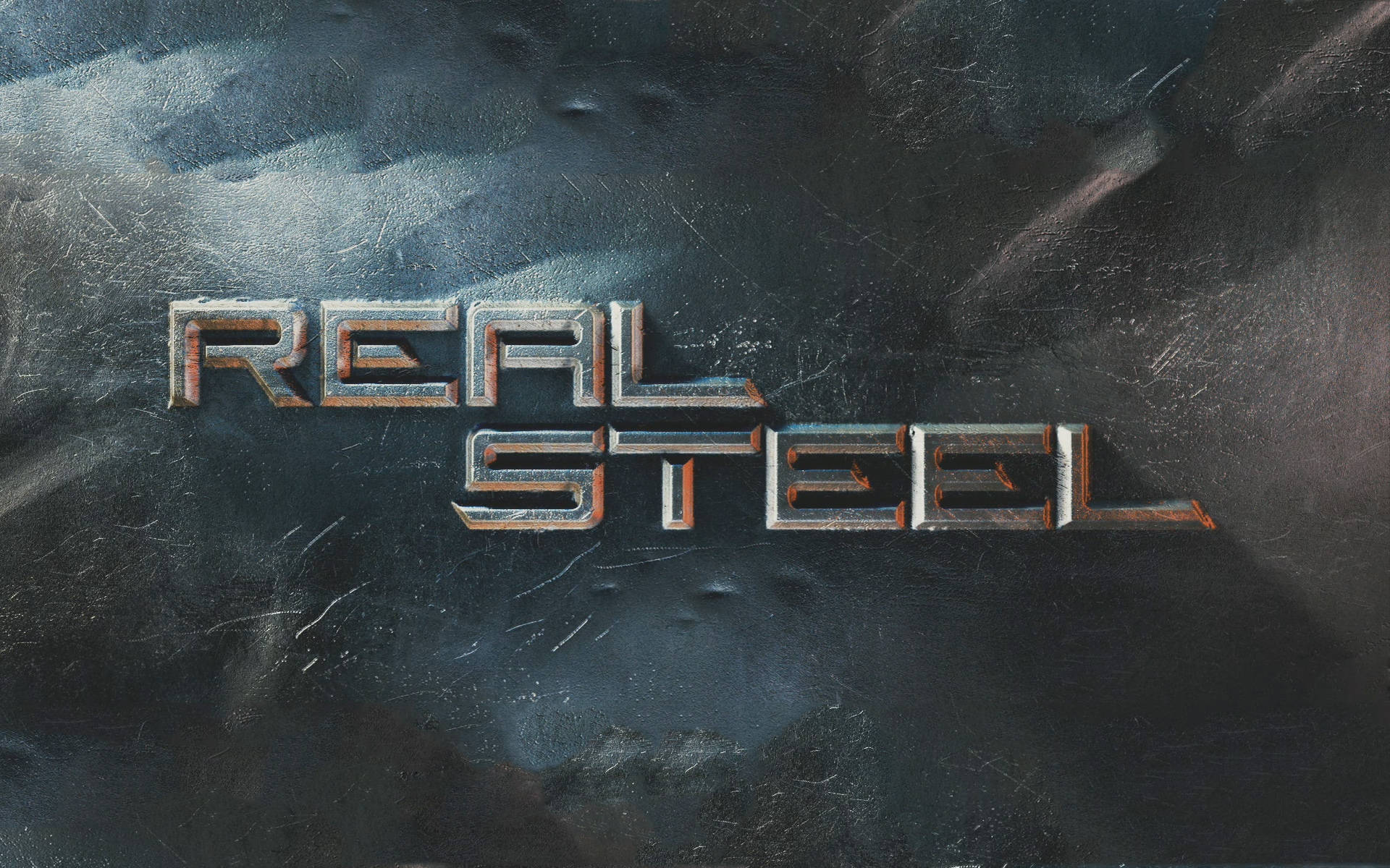 電影 桌布 壁紙 — 「REAL STEEL」這幾個字以粗獷的金屬字母在刮花的深色鋼鐵表面上發光。