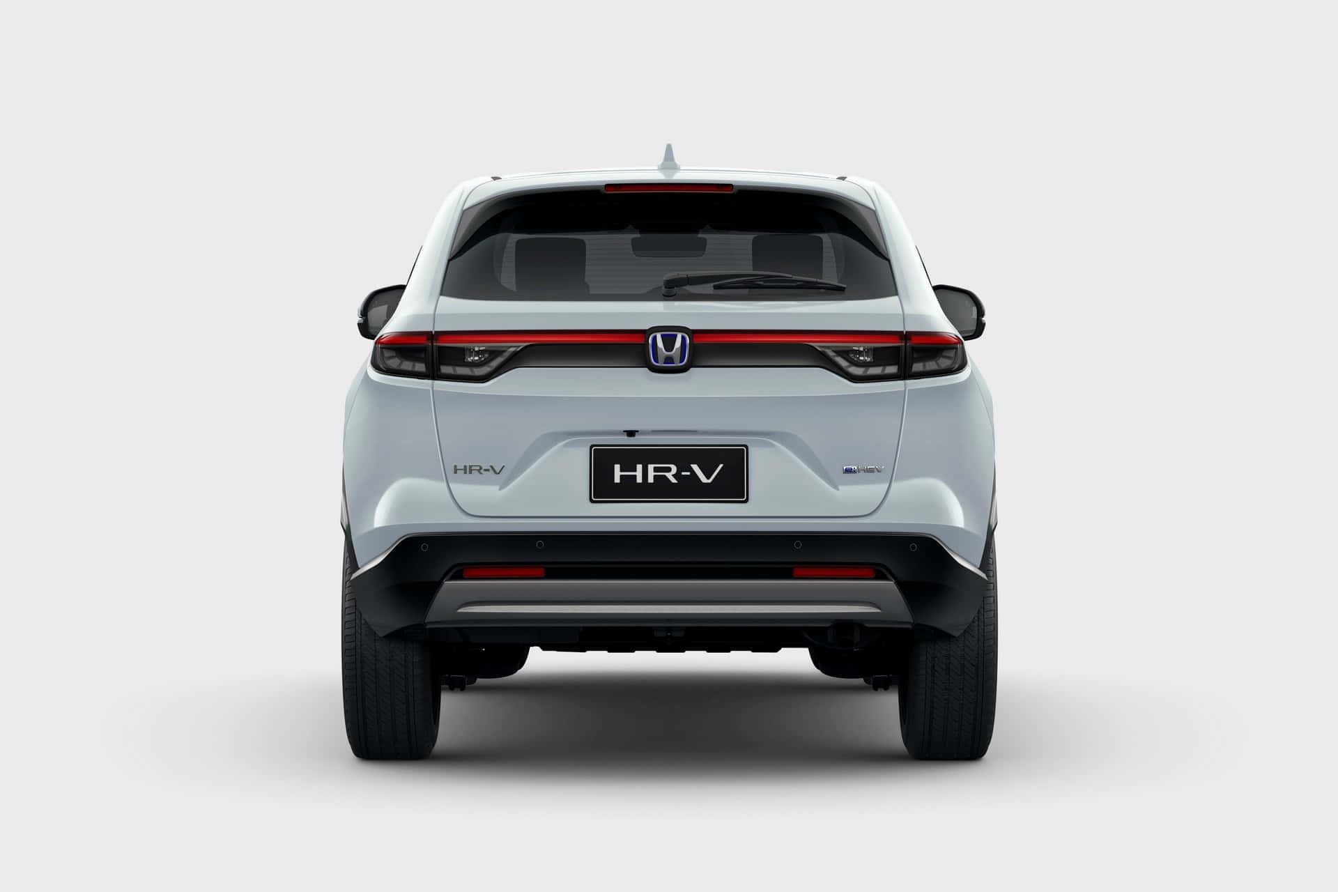 Honda Hr-v 桌布 壁紙 — 純色工作室背景前，時尚白色本田 HR-V SUV 的後視圖，帶有紅色重點照明。