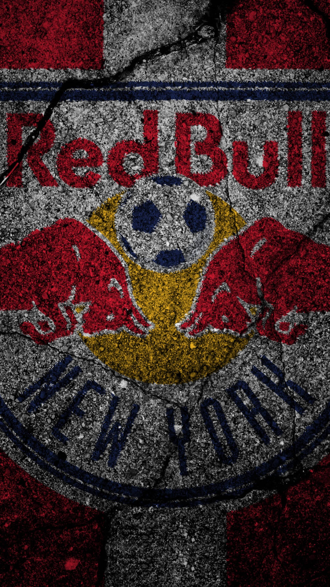 足球 桌布 壁紙 — Red Bull New York 足球標誌繪在裂開的混凝土上，帶有粗糙質感和鮮明的紅、黃、藍色。