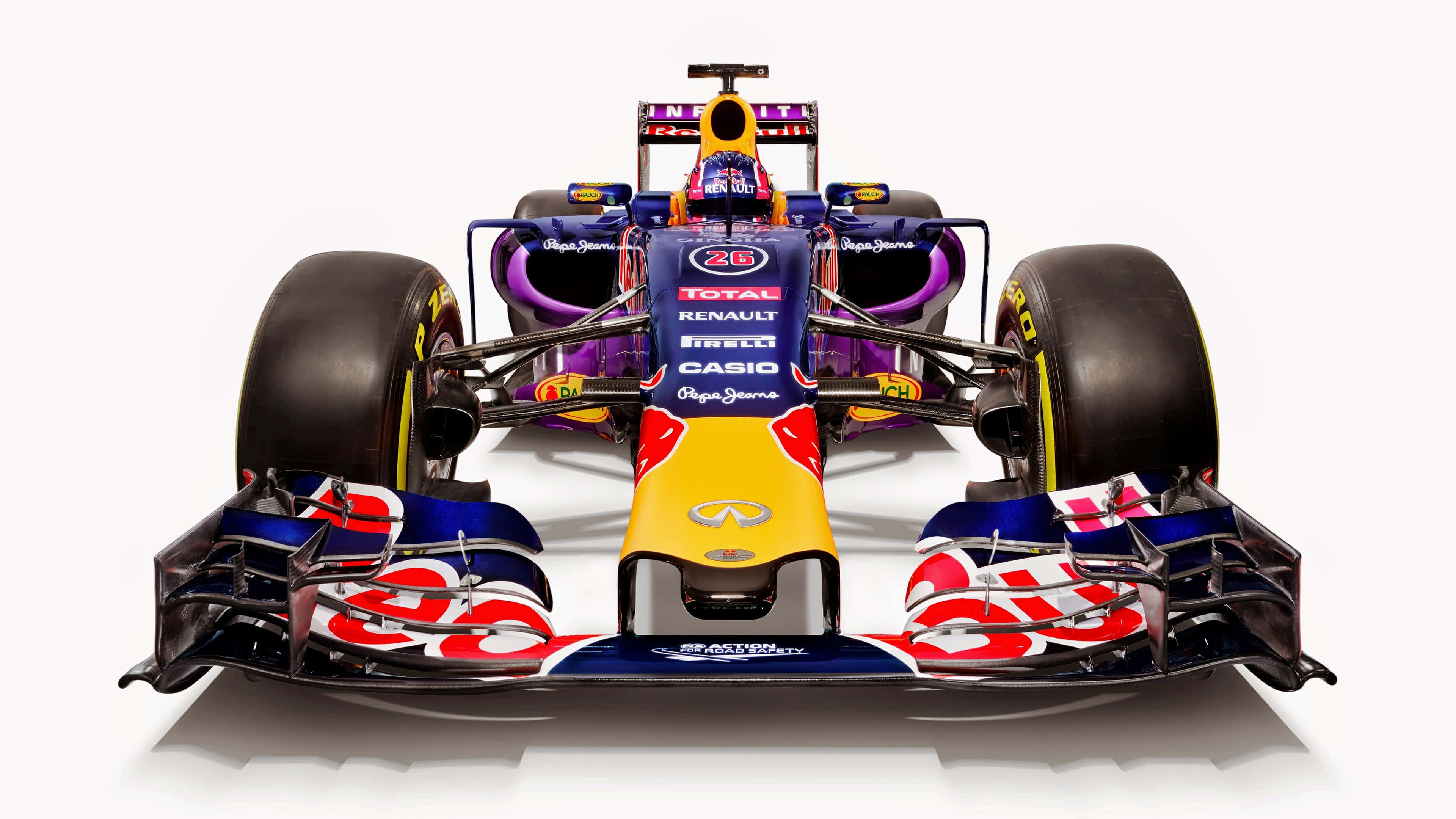 紅牛 桌布 壁紙 — Red Bull Racing 一級方程式賽車的正面照片，車身採用鮮豔的藍、黃、紅配色，背景為純白色。