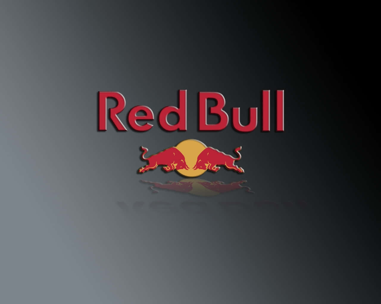 紅牛 桌布 壁紙 — Red Bull 標誌，兩頭紅牛衝向一個黃色圓圈，背景為深色漸變並帶有微妙反射。