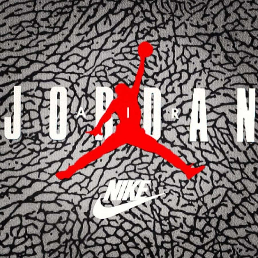 裂紋灰色布料上的紅色Jumpman標誌，帶有白色Jordan和Nike文字。 — Jordan Logo 壁紙