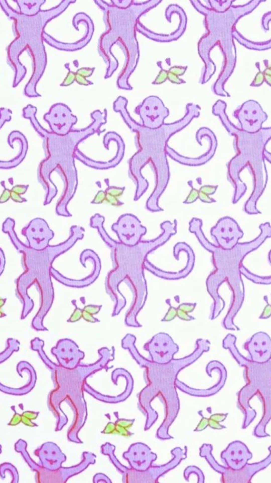  壁紙 — 白色背景上帶有綠色葉子的快樂紫色卡通猴子重複圖案。