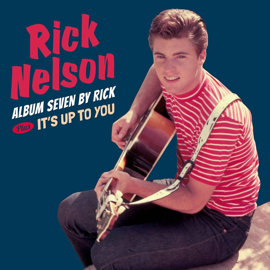 專輯封面 桌布 壁紙 — Rick Nelson 微笑著，手持一把木吉他，背景為純藍色，並帶有專輯文字。
