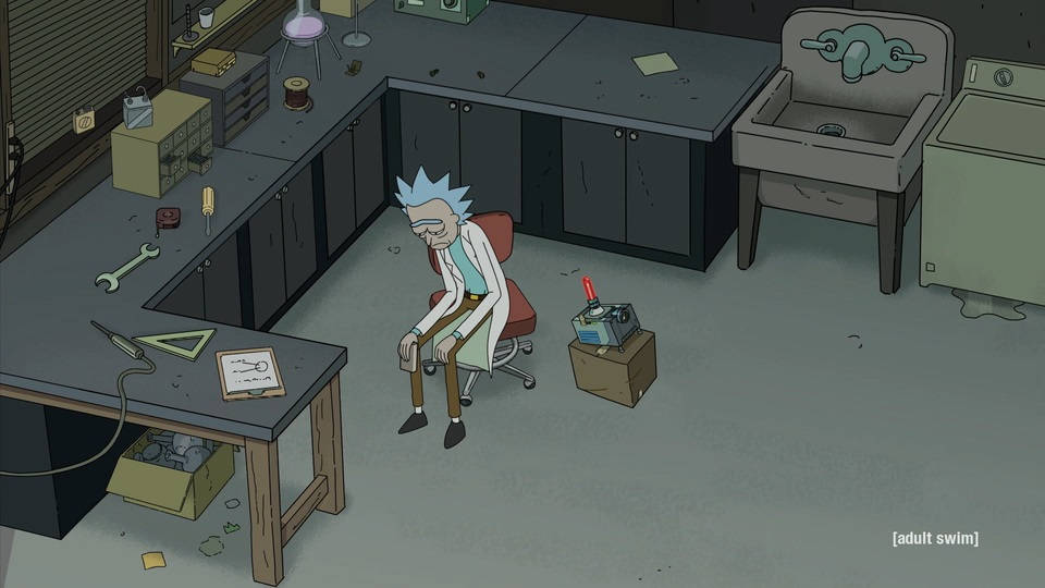 Rick And Morty Sad 桌布 壁紙 — Rick Sanchez 癱坐在一個雜亂的實驗室裡，裡面滿是損壞的小工具和凌亂的工作檯。