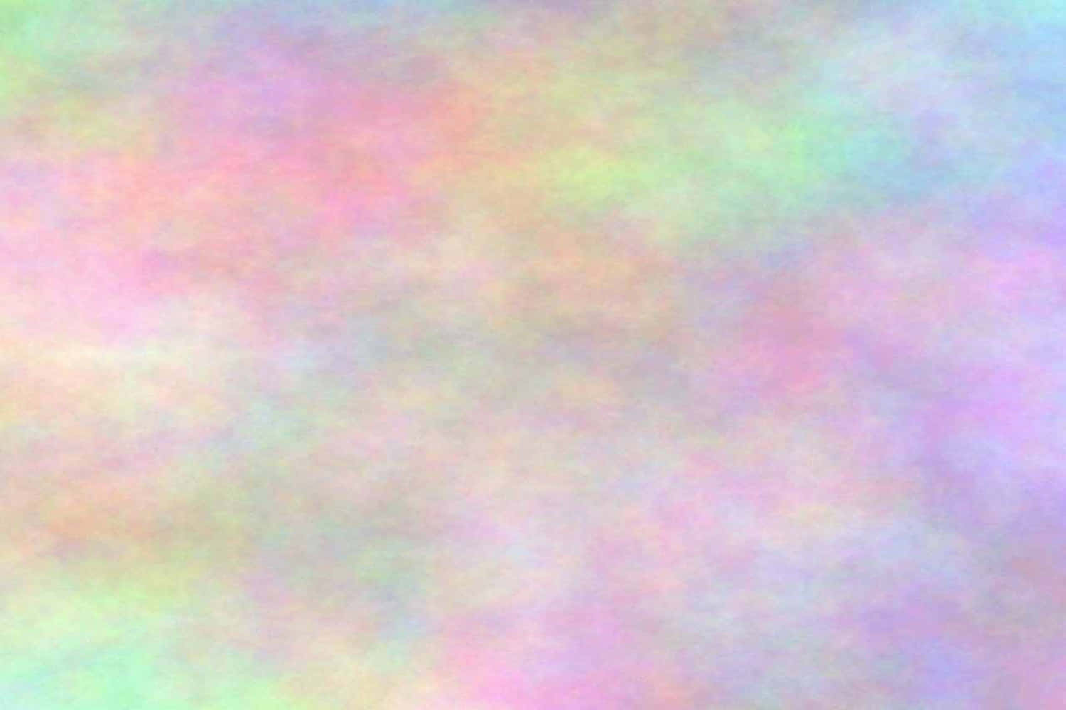 一個柔和的粉彩漸變，混合色調營造出夢幻的抽象背景。 — Pastel 壁紙