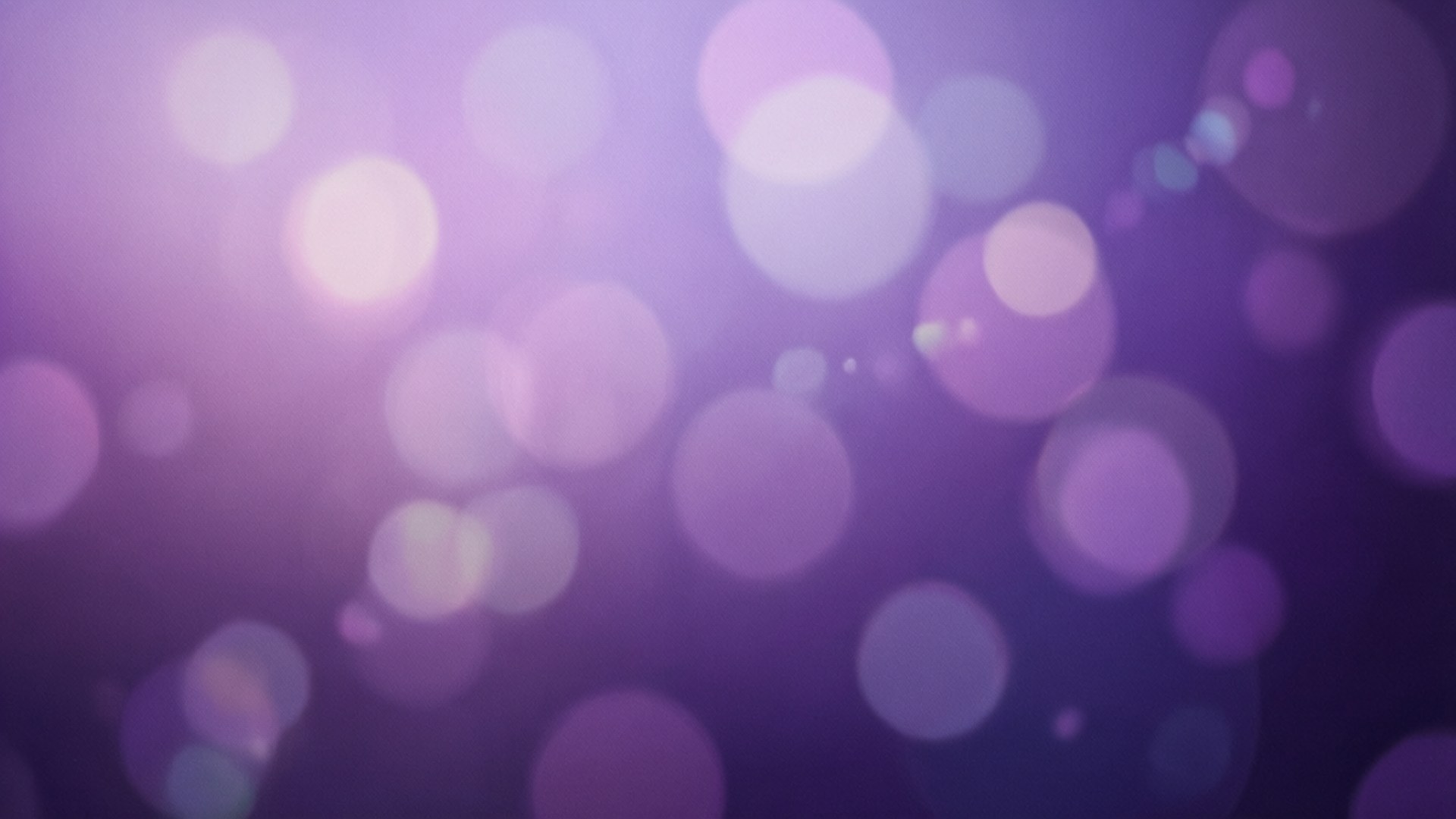 Violet Bokeh Gradient 壁紙 — 柔和發光的漸變紫色散景圓圈營造出夢幻般的抽象背景。