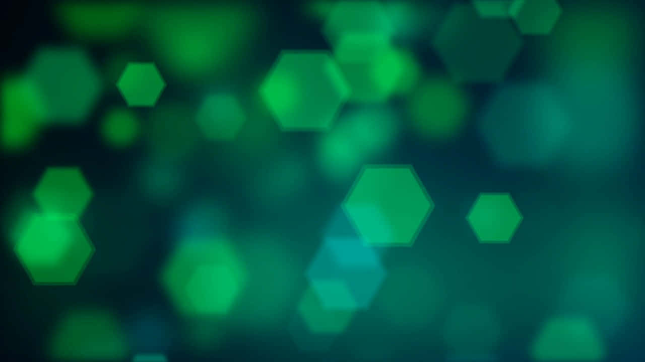  壁紙 — 柔和發光的綠色六邊形漂浮在夢幻漸變背景中，帶有模糊的散景效果。