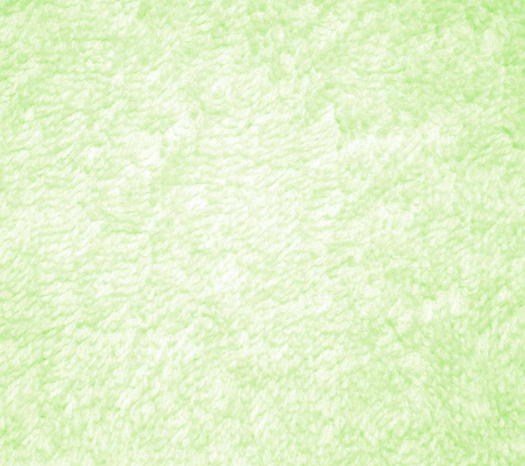 Green Texture 桌布 壁紙 — 柔軟的薄荷綠色紋理布料，帶有蓬鬆纖維表面和微妙的燈光變化。