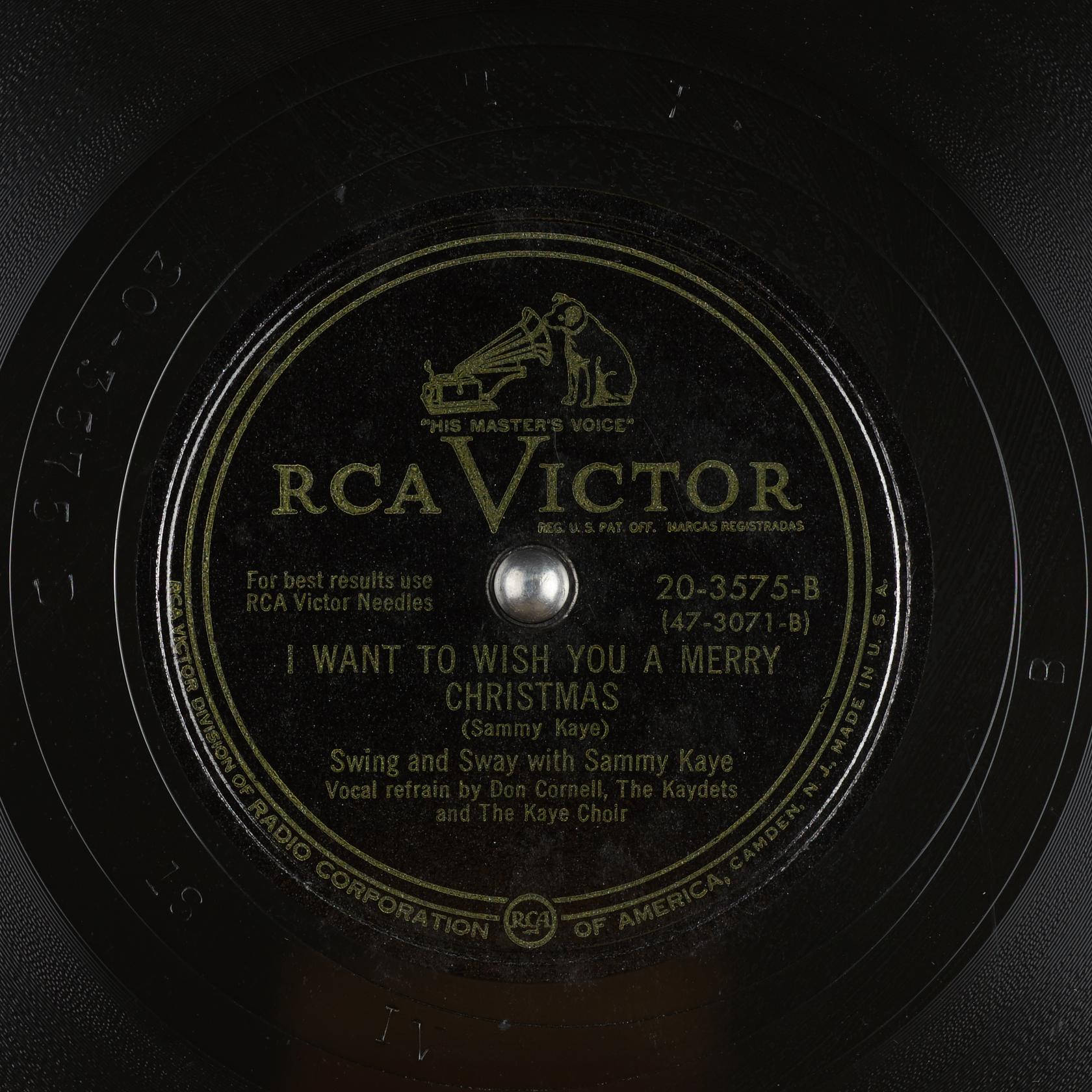 vinyl 桌布 壁紙 — Sammy Kaye 的《I Want to Wish You a Merry Christmas》的復古 RCA Victor 78 RPM 唱片標籤特寫。