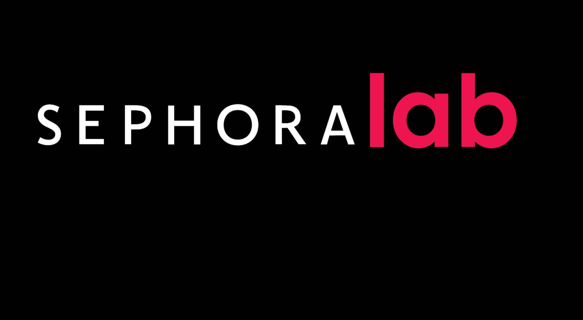 Sephora 桌布 壁紙 — Sephora lab 標誌，以白色和粉紅色文字顯示在純黑色背景上。