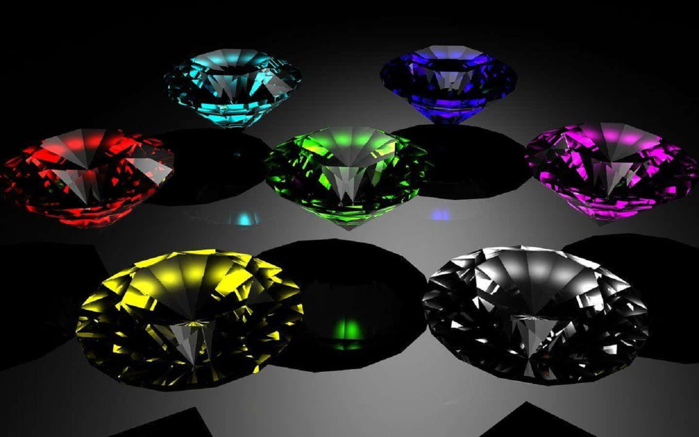 Chaos Emeralds 桌布 壁紙 — 七顆色彩鮮豔的寶石在深色漸變背景上閃爍著內在光芒。