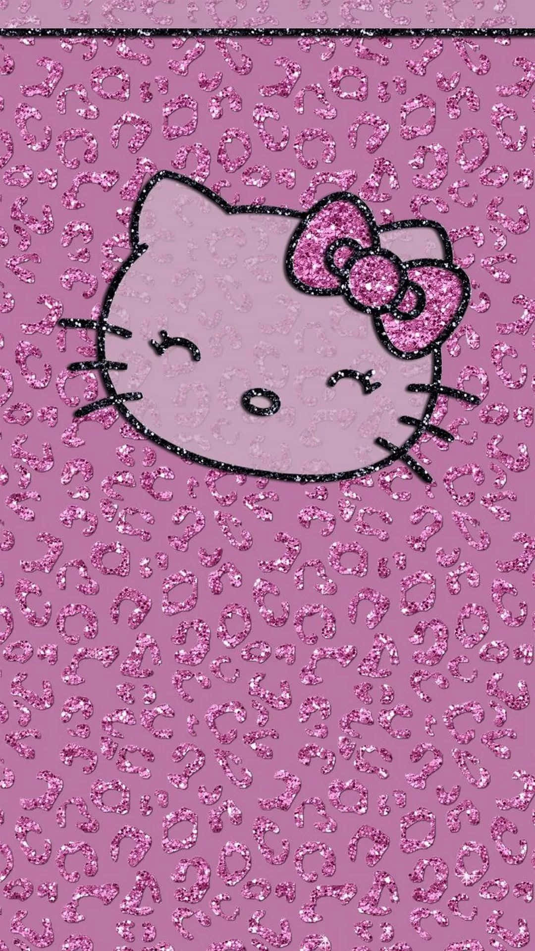  壁紙 — 一個閃粉粉紅色Hello Kitty臉龐戴著蝴蝶結，在閃爍的豹紋背景上微笑。