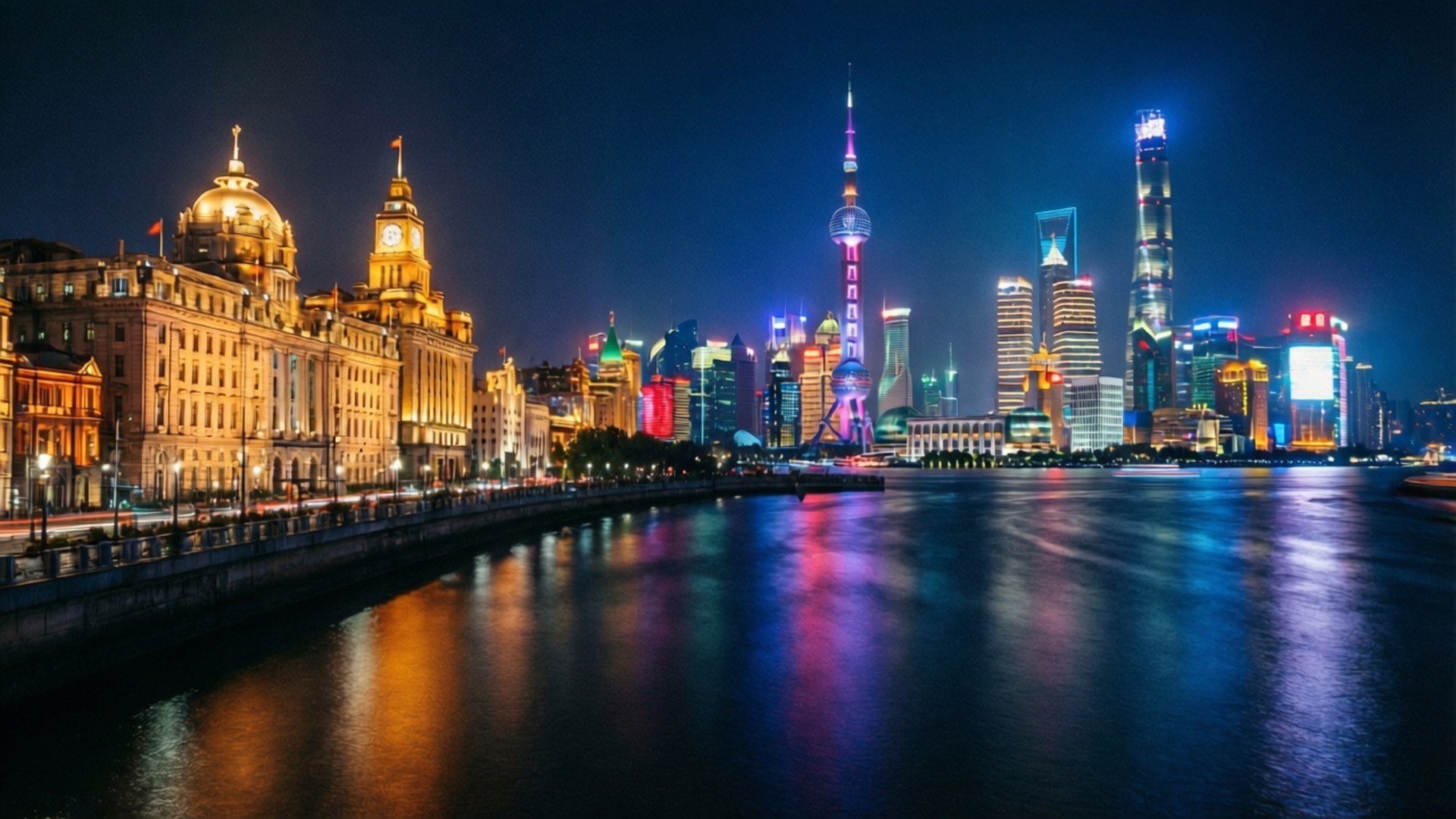 The Bund Night Glow 壁紙 — 上海天際線的迷人夜景，歷史建築和現代摩天大樓沿著黃浦江閃耀。