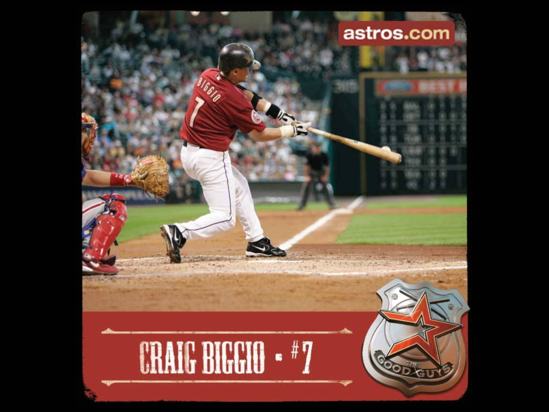 棒球選手Craig Biggio在比賽中揮棒，身後有捕手。 — MLB 壁紙