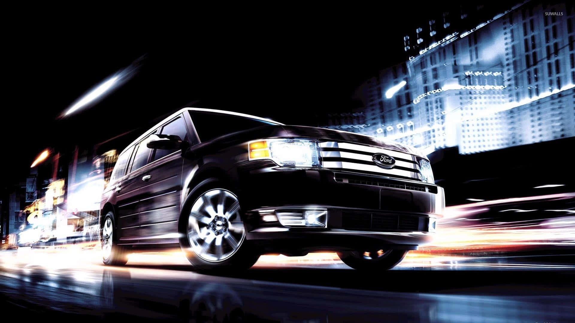 Ford Edge 桌布 壁紙 — 一輛時尚的黑色福特SUV在夜間穿梭於霓虹燈閃爍的城市，動態模糊的條紋照亮了濕漉漉的街道。