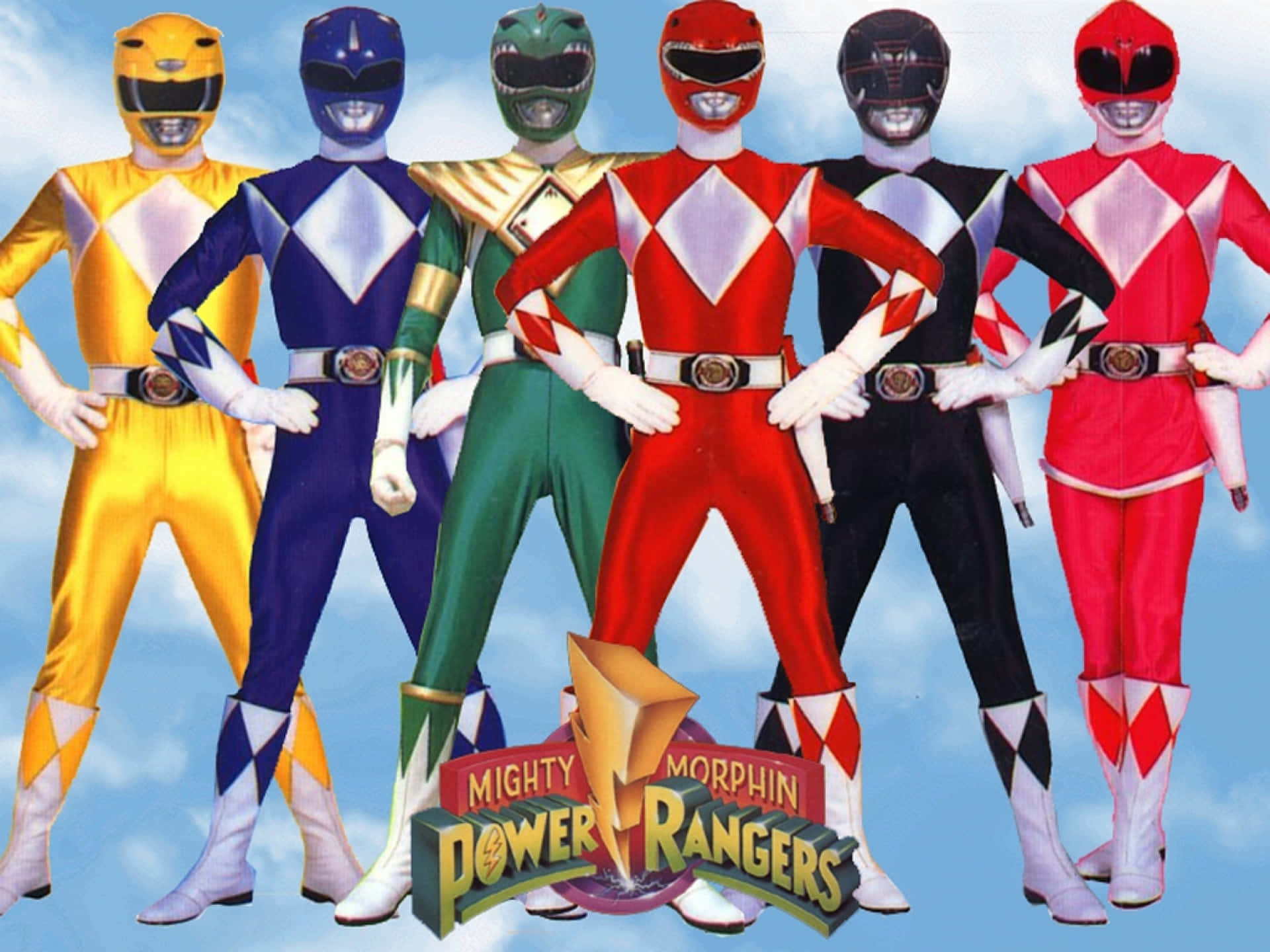  壁紙 — 六位Mighty Morphin Power Rangers身穿色彩繽紛的戰衣，自信地站在藍天白雲下。