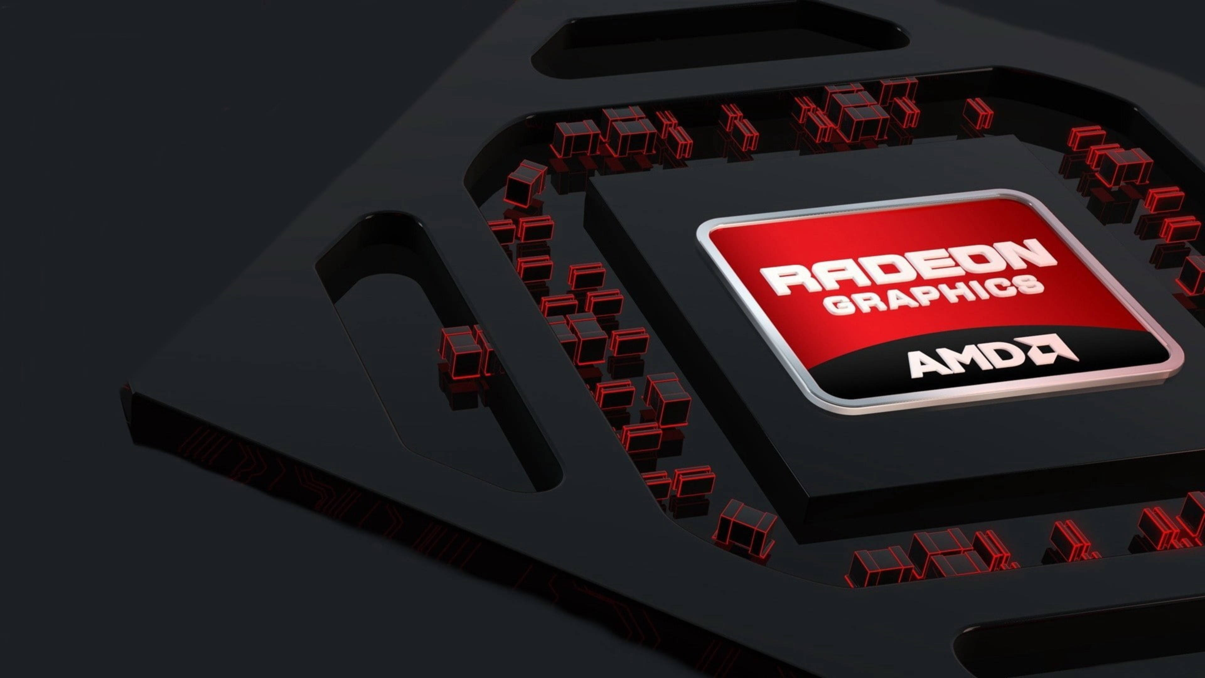 AMD Radeon Graphics GPU晶片的特寫，帶有紅色發光組件。 — Amd 壁紙