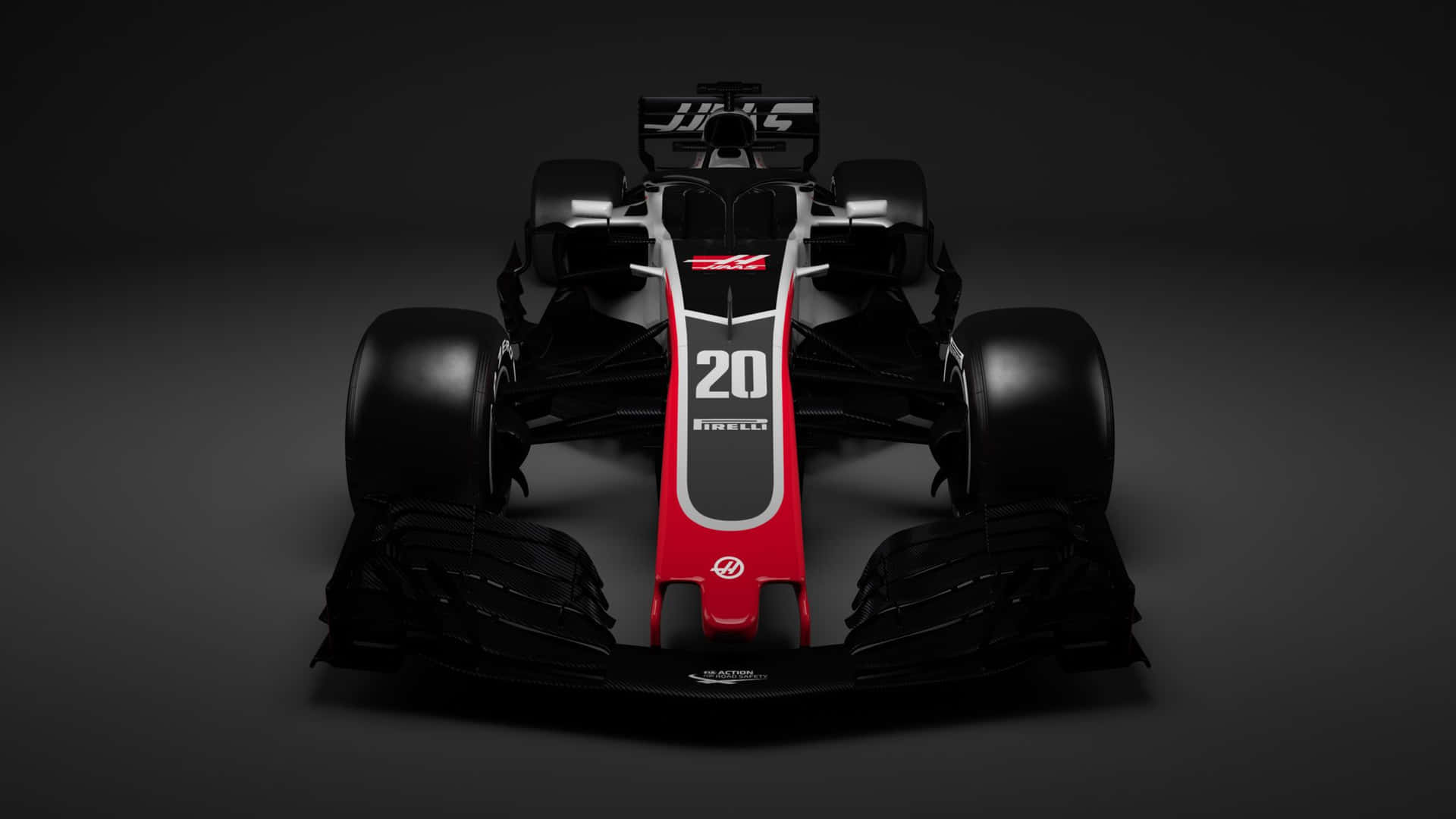 黑色和紅色的一級方程式賽車，號碼20，在工作室燈光下。 — F1 壁紙