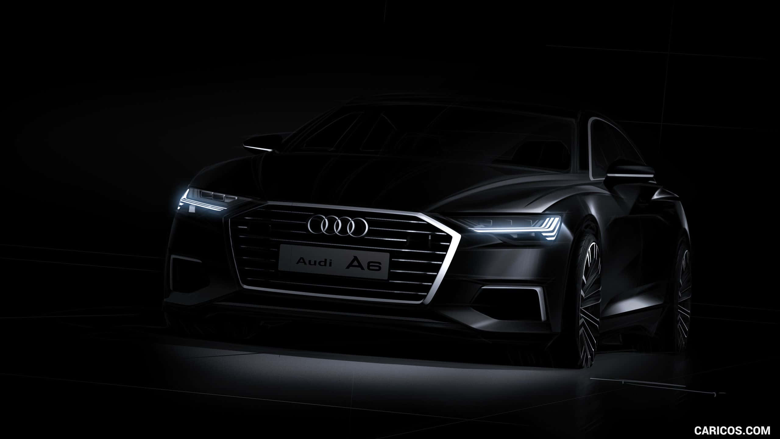 Audi S6 桌布 壁紙 — 一輛時尚的黑色奧迪A6轎車在戲劇性的聚光燈下發光，背景是黑暗的工作室，車頭燈閃爍。