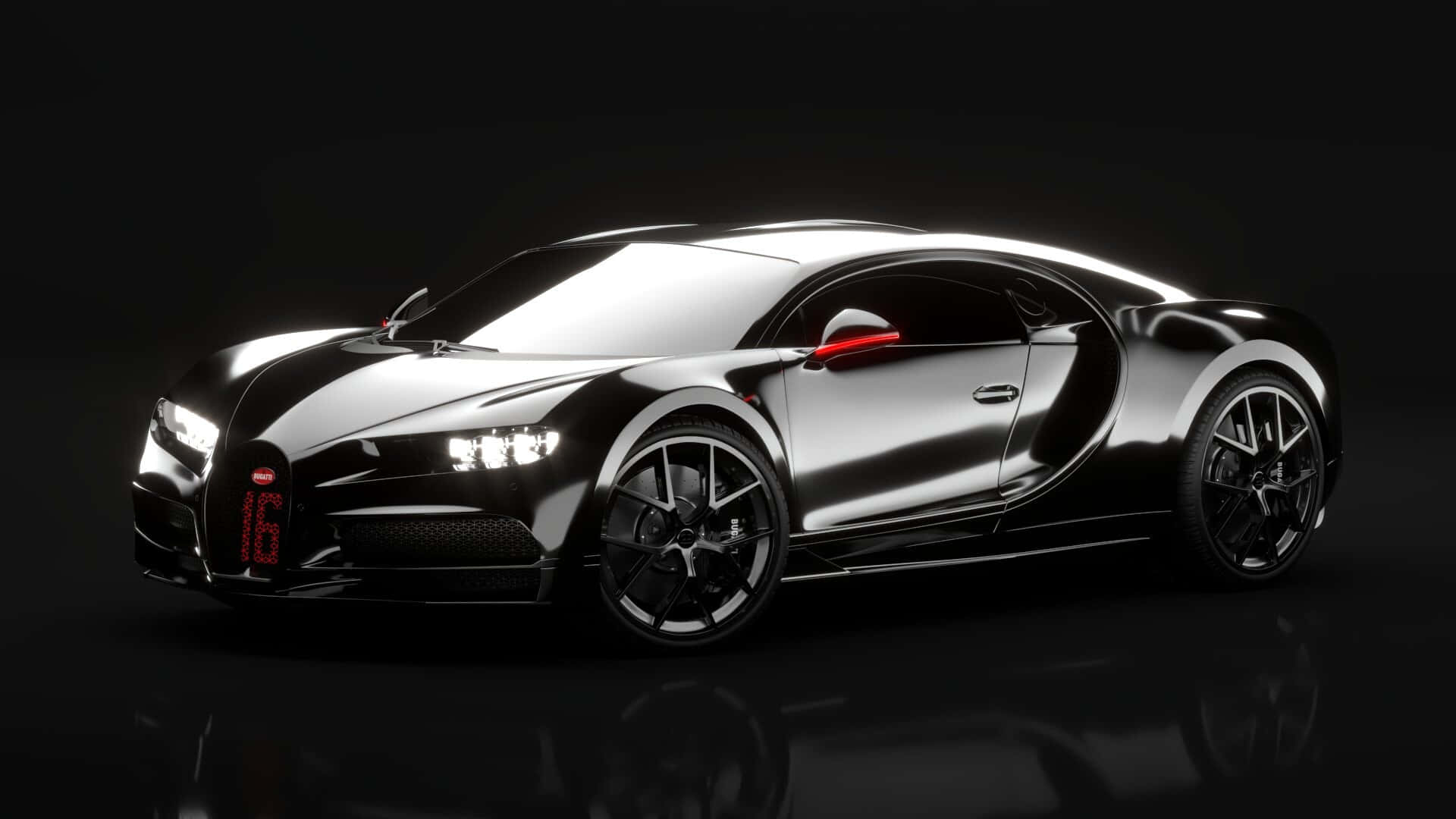 Bugatti Chiron 桌布 壁紙 — 一輛帶有紅色點綴的時尚黑色Bugatti Chiron在暗色反光地板上於攝影棚燈光下閃閃發光。