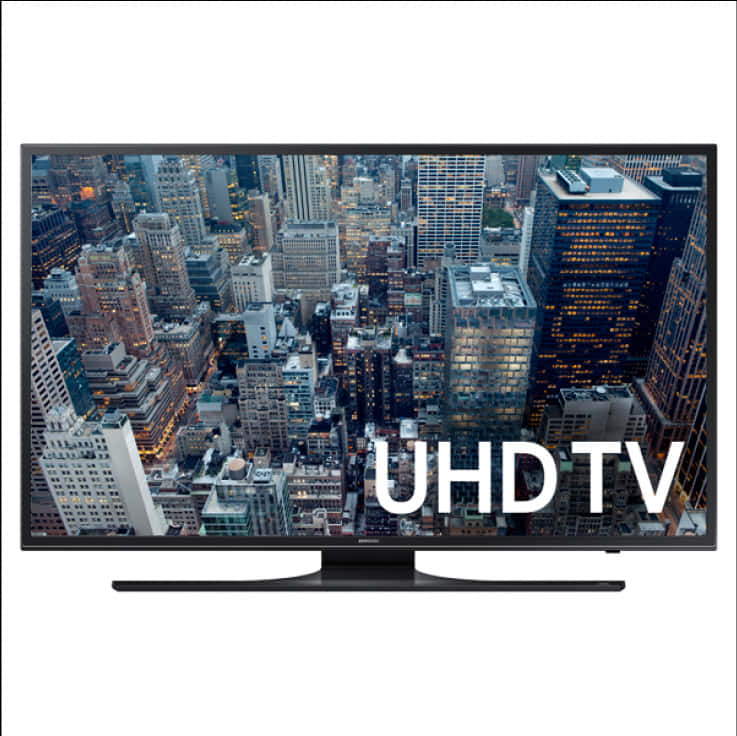 黑色 UHD 電視顯示夜間天際線，建築物燈火通明。 — 4K 壁紙