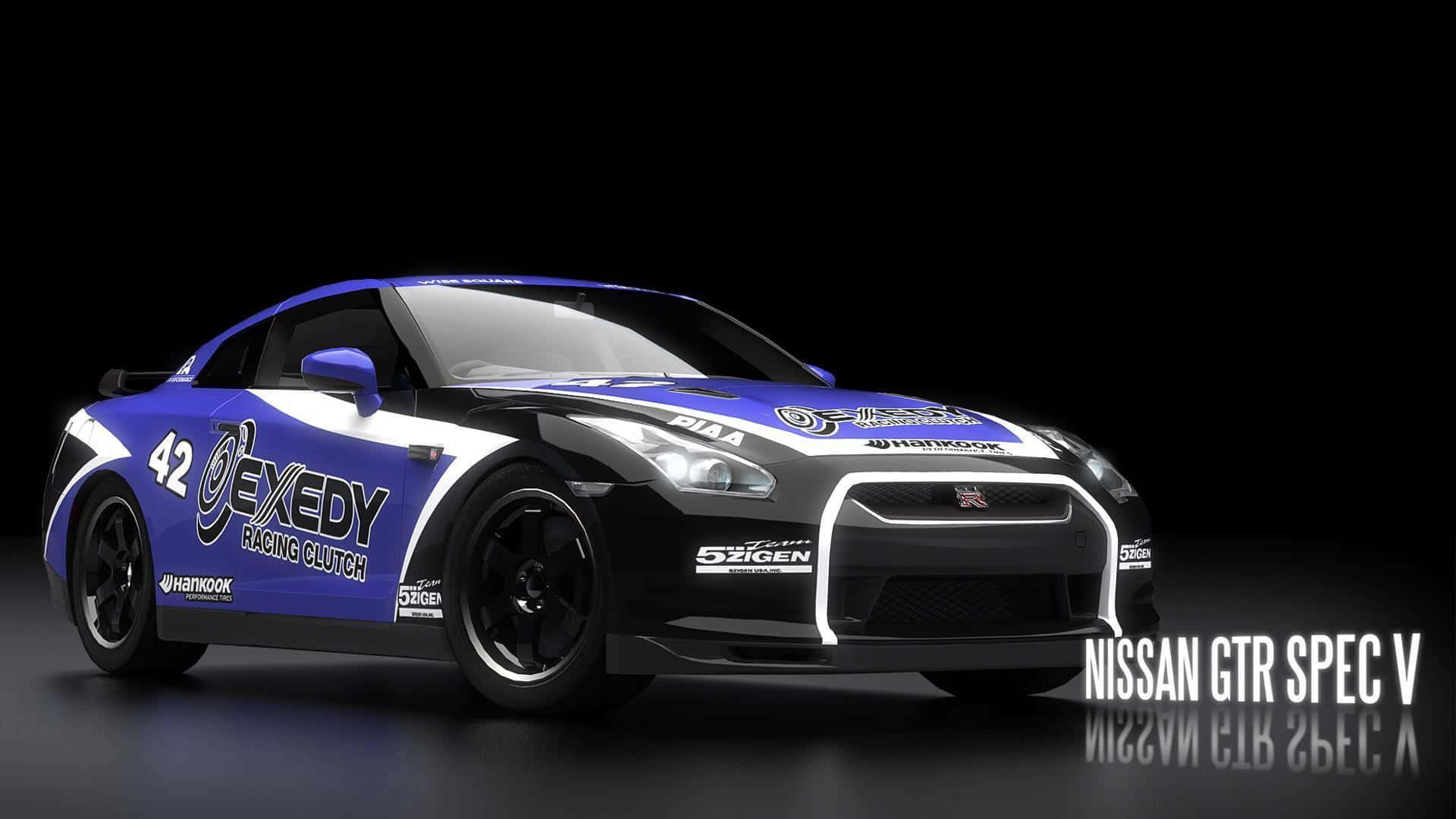 工作室中的藍黑日產GTR Spec V賽車，帶有贊助商標誌 — Gtr 桌面 壁紙
