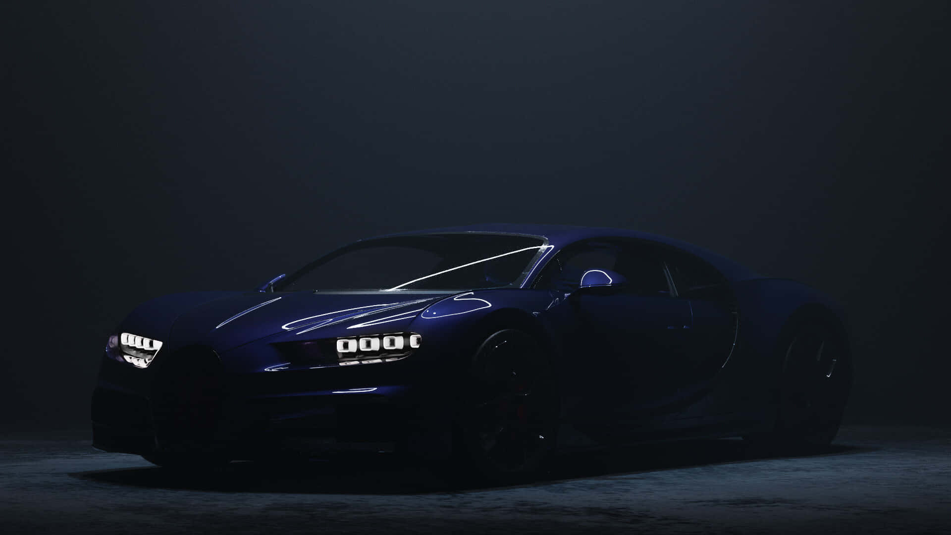 Bugatti Chiron 桌布 壁紙 — 一輛時尚的藍色Bugatti Chiron在黑暗的攝影棚中，在戲劇性的聚光燈下閃閃發光。