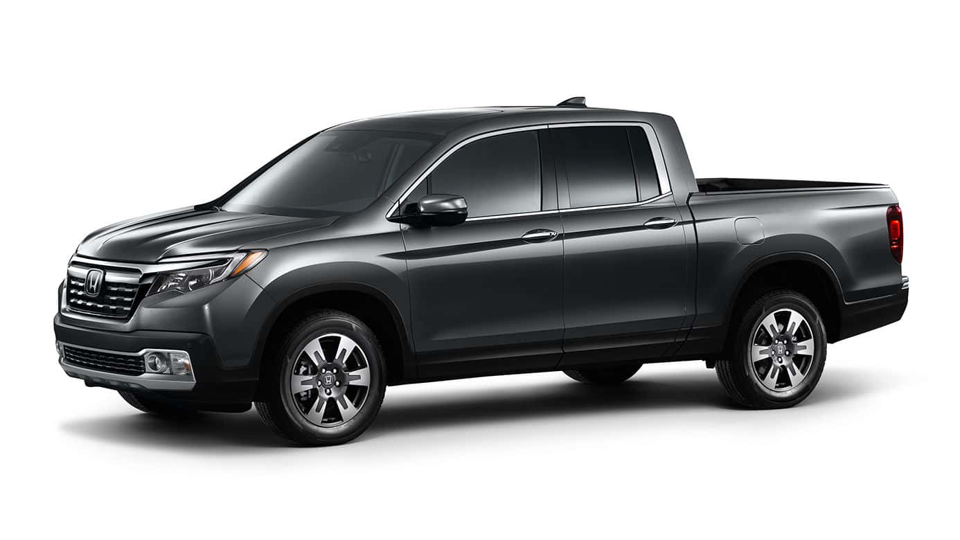 Honda Ridgeline 桌布 壁紙 — 一輛時尚的深灰色本田 Ridgeline 皮卡車在乾淨的白色背景上以側面輪廓展示。