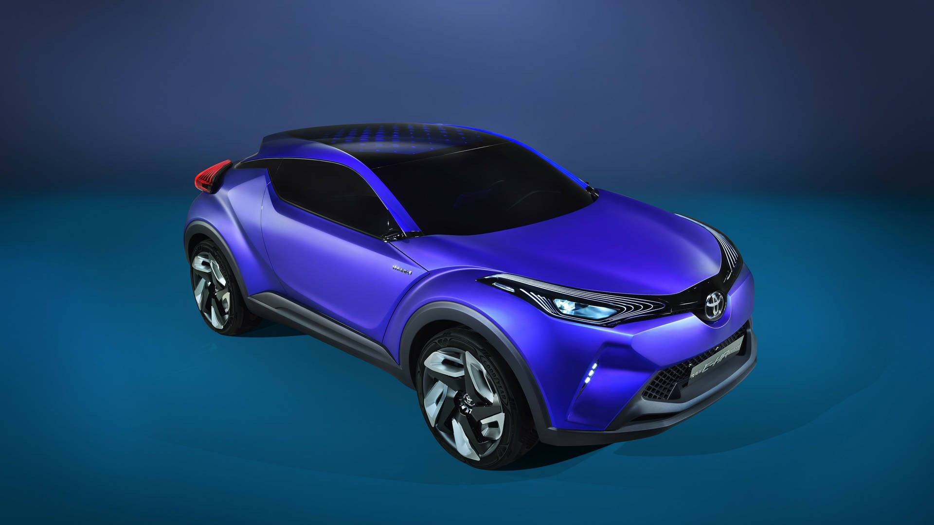 未來感藍色豐田概念車，在工作室環境中配備發光頭燈。 — Toyota Supra 壁紙