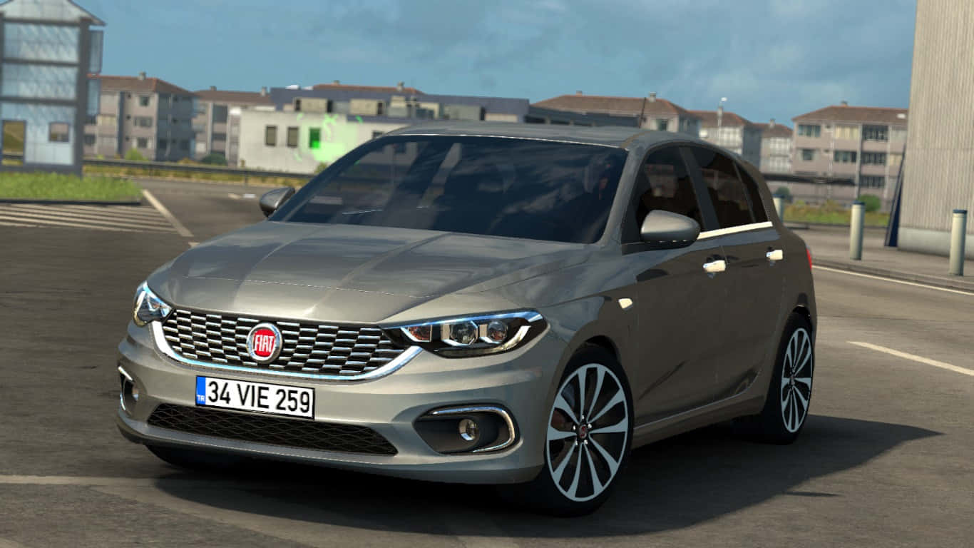 Fiat Tipo 桌布 壁紙 — 一輛時尚的銀色 Fiat Punto 停放在瀝青停車場，背景是住宅建築，天空晴朗。
