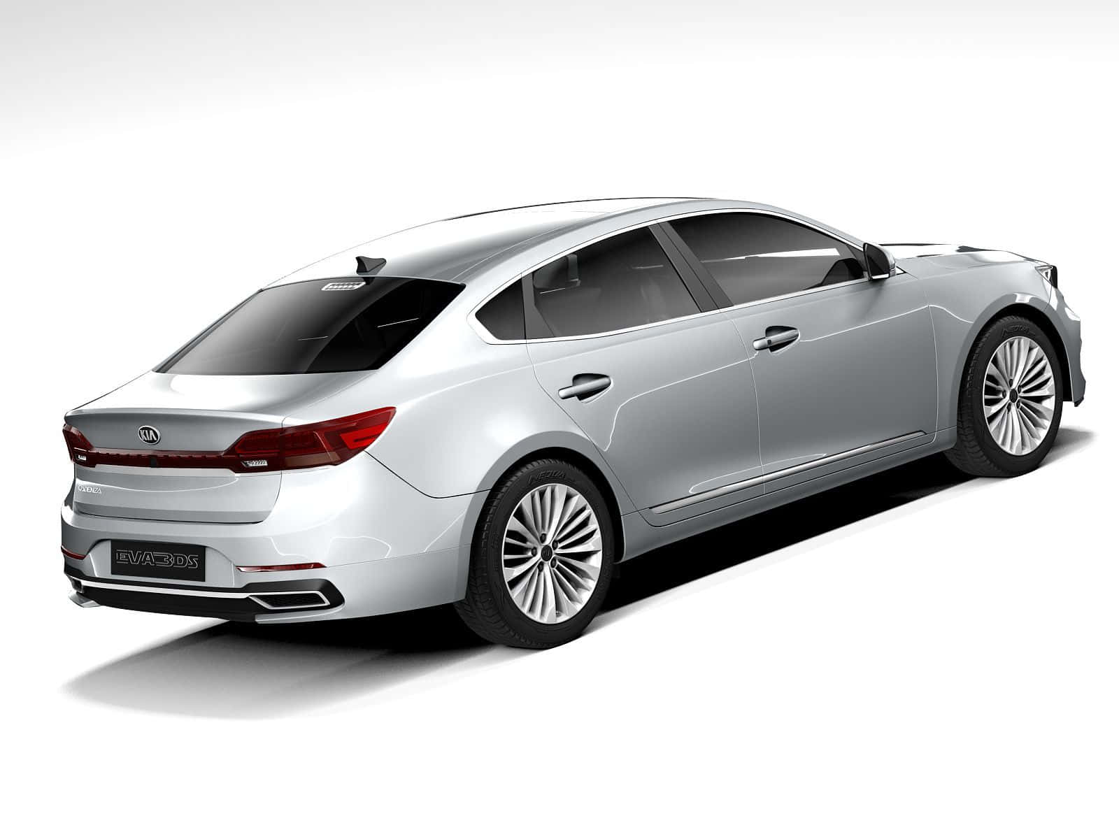 Kia Cadenza 桌布 壁紙 — 一輛時尚的銀色Kia EV9轎車以四分之三後視圖展示在乾淨的白色工作室背景前。