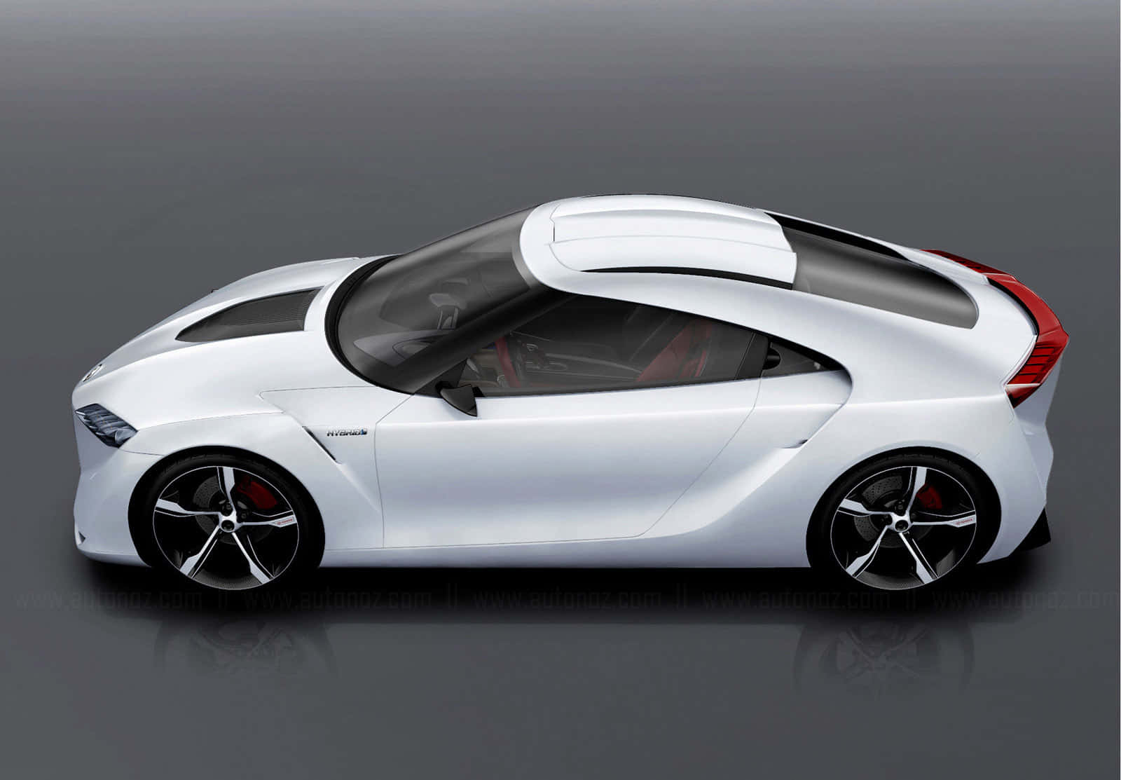白色未來感跑車，帶紅色裝飾，在工作室環境中 — Toyota Supra 壁紙