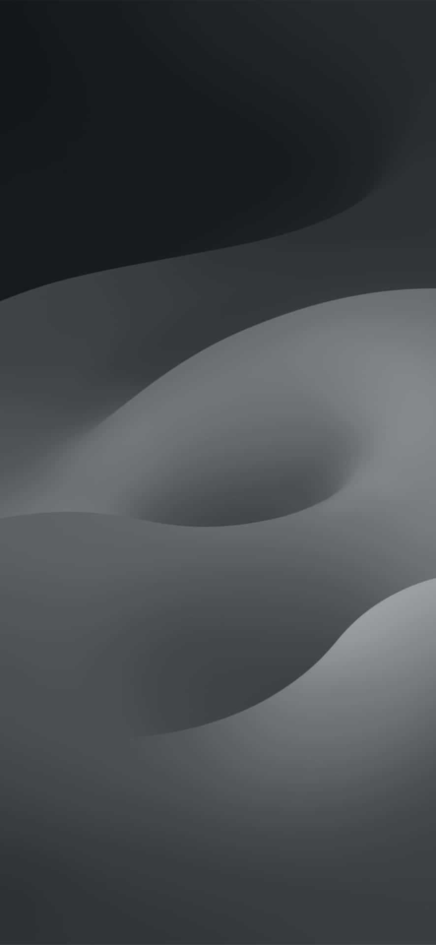  壁紙 — 炭灰色和柔和灰色的平滑抽象波浪以柔和的曲線流過框架。