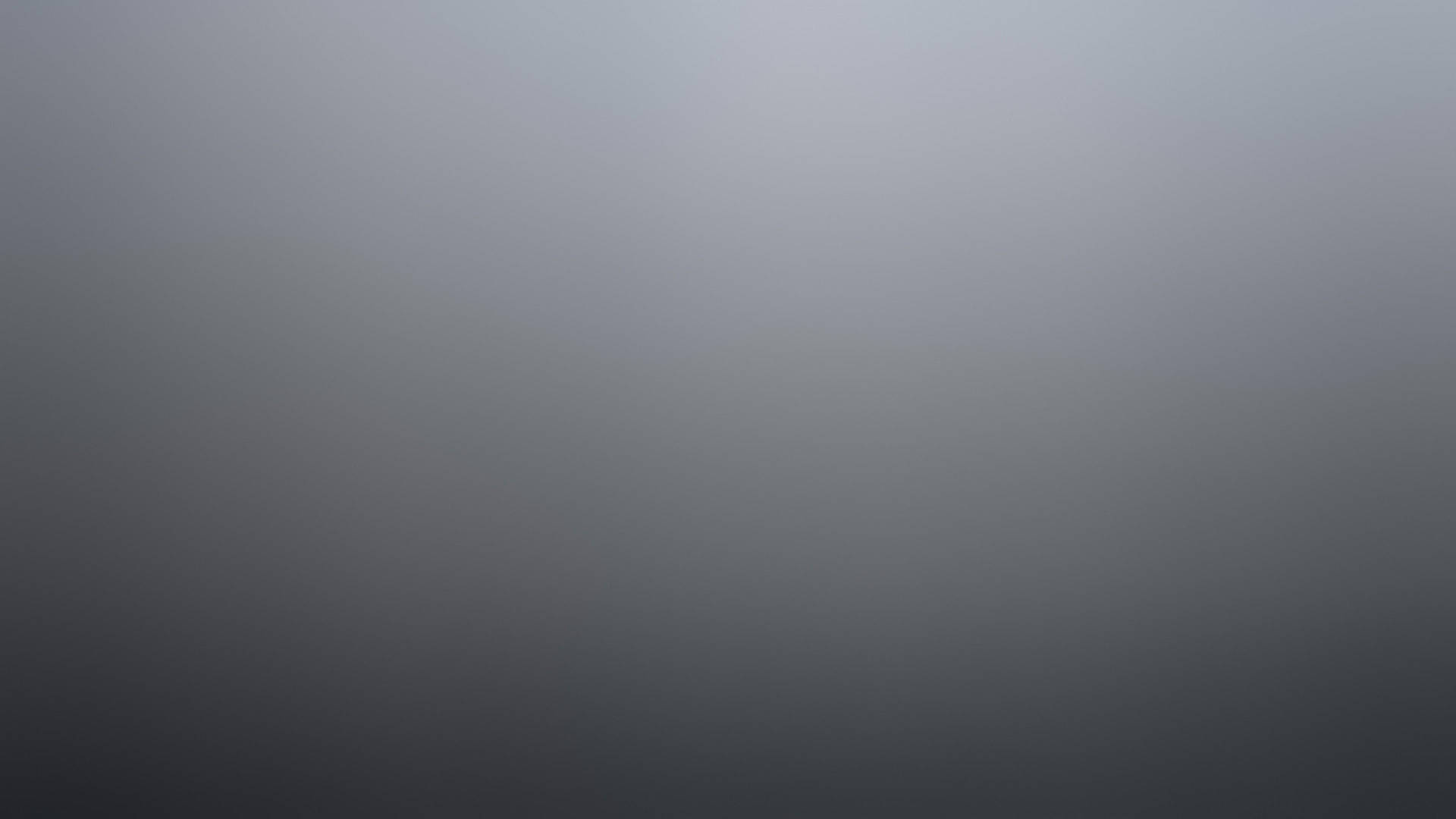 用於設計的平滑灰色到炭灰色漸變背景。 — 背景 壁紙