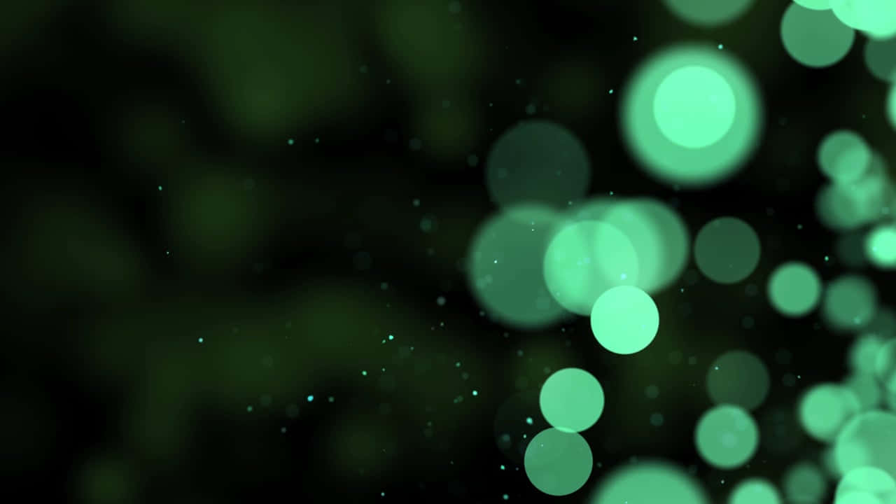  壁紙 — 柔和的發光綠色球體在黑暗背景上漂浮，營造出夢幻般的空靈氛圍。