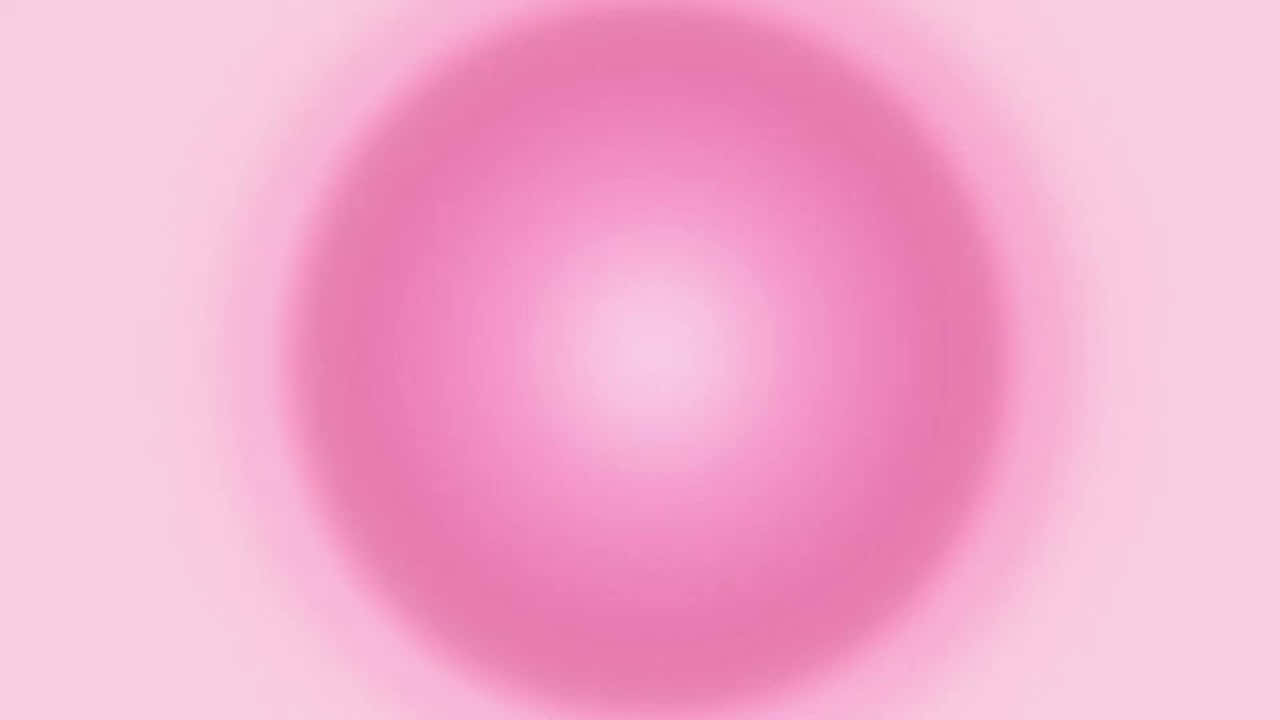  壁紙 — 一個柔和的漸變圓圈在淡粉紅色背景上散發出溫柔的粉紅色調，營造出舒緩的抽象光芒。
