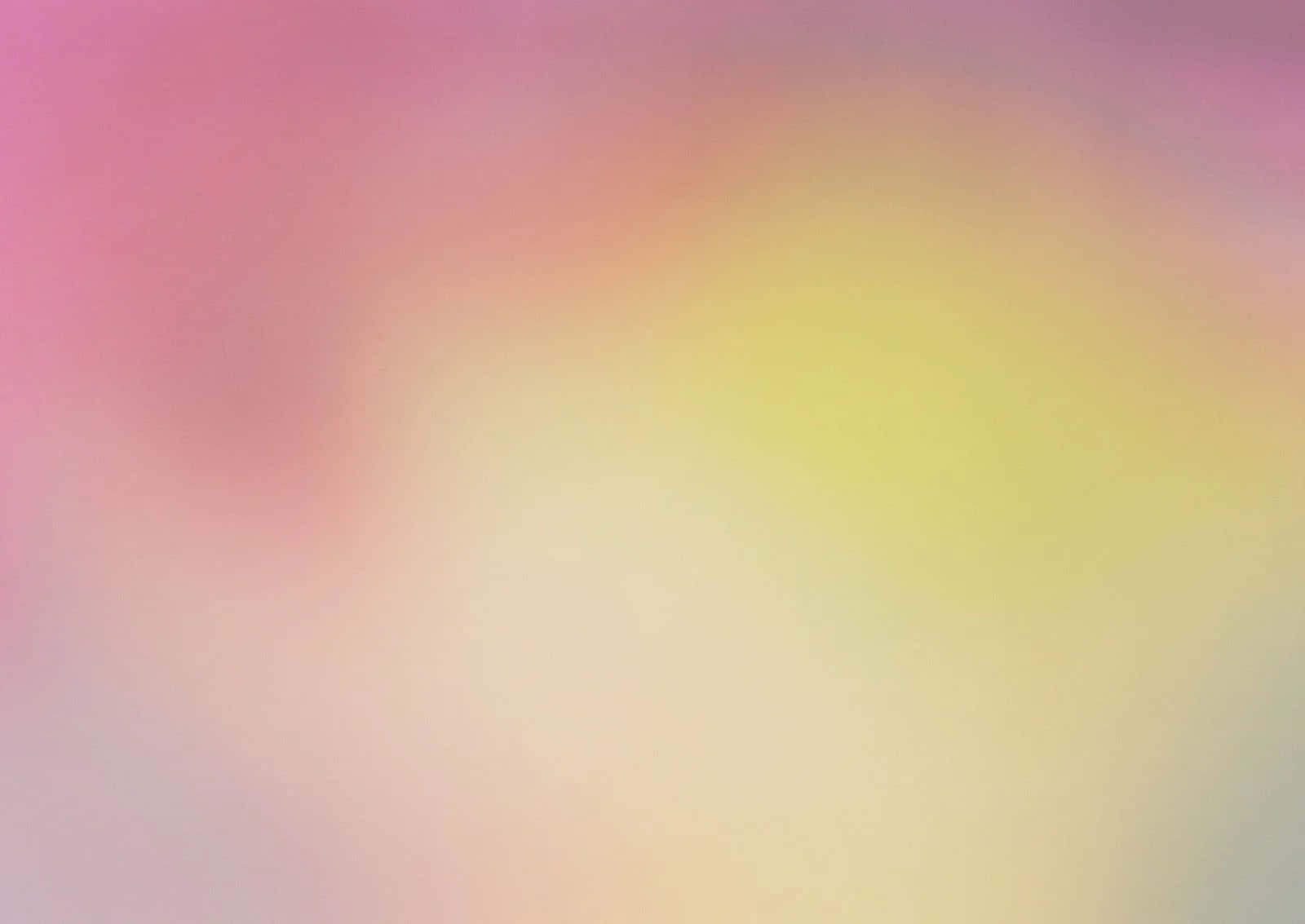  壁紙 — 柔和的粉紅、蜜桃和黃色漸變，融合成溫柔夢幻的迷霧。