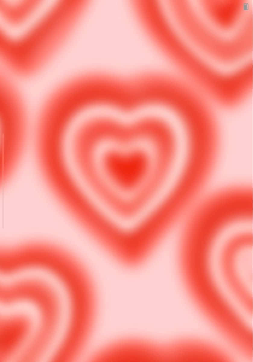 Pink Heart Aura 桌布 壁紙 — 柔和粉紅與紅色模糊心形，以溫柔漸層營造夢幻浪漫圖案。