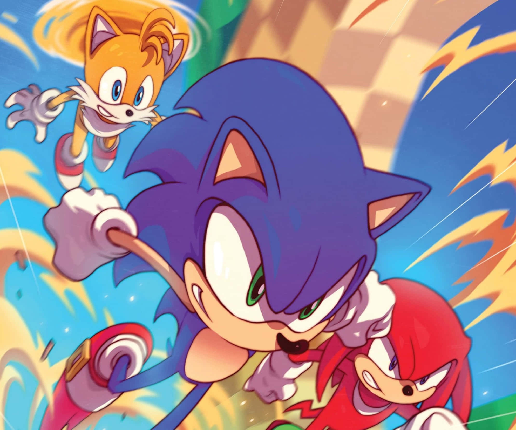 Sonic And Tails 桌布 壁紙 — Sonic、Tails 和 Knuckles 並排穿過充滿活力的格紋隧道，帶有動態模糊和黃色能量條紋。