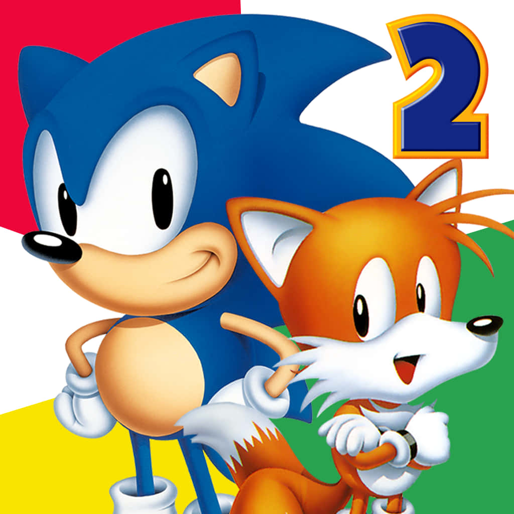 桌布 壁紙 — Sonic the Hedgehog 和 Tails 自信地站在一個大膽的紅、黃、綠背景前，還有一個大數字二。