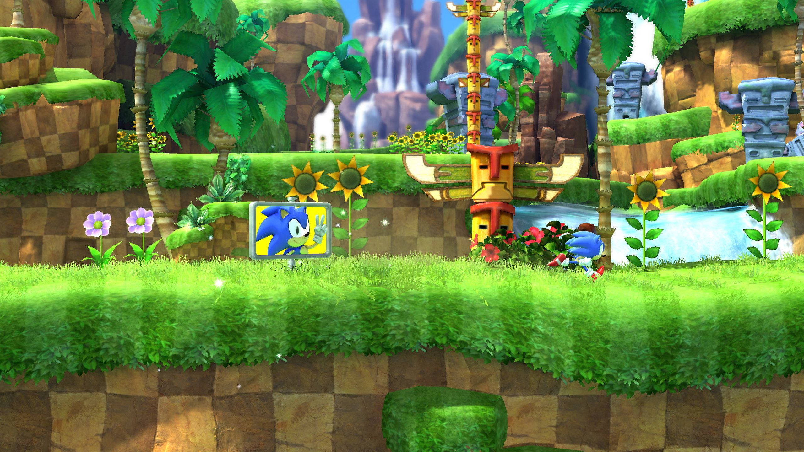 電玩遊戲 桌布 壁紙 — Sonic the Hedgehog 穿過一個充滿活力的叢林關卡，有向日葵、瀑布和古代遺跡。